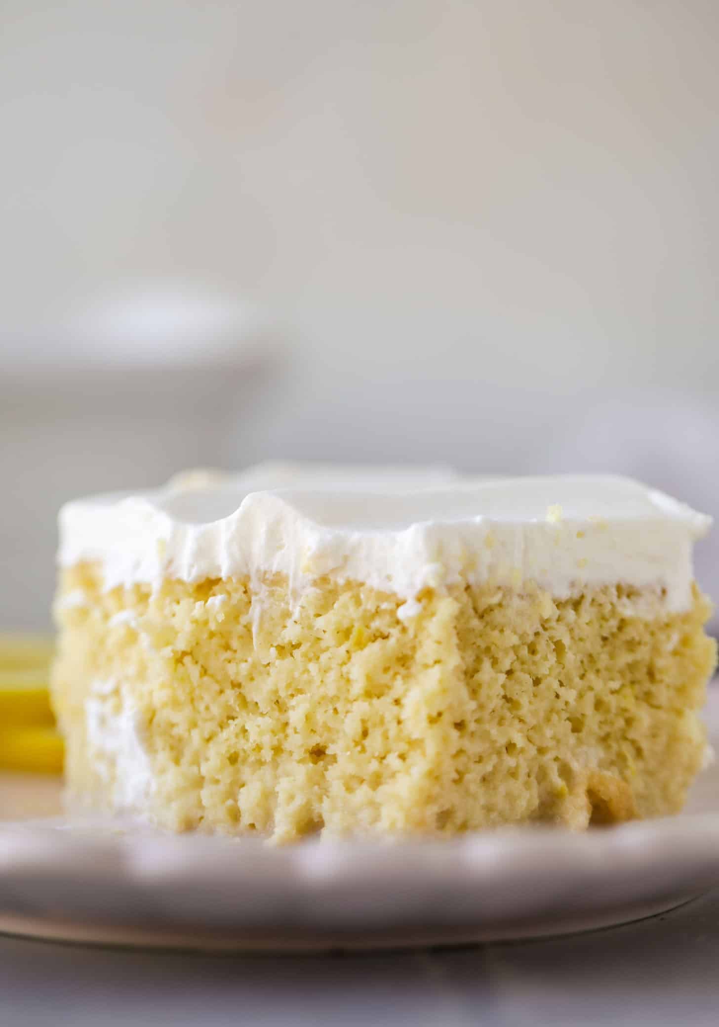 simple lemon tres leches cake with whipped cream