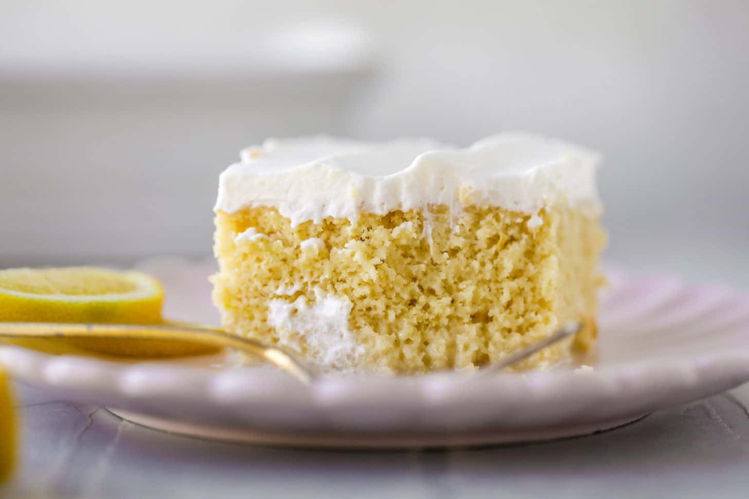 simple lemon tres leches cake with whipped cream