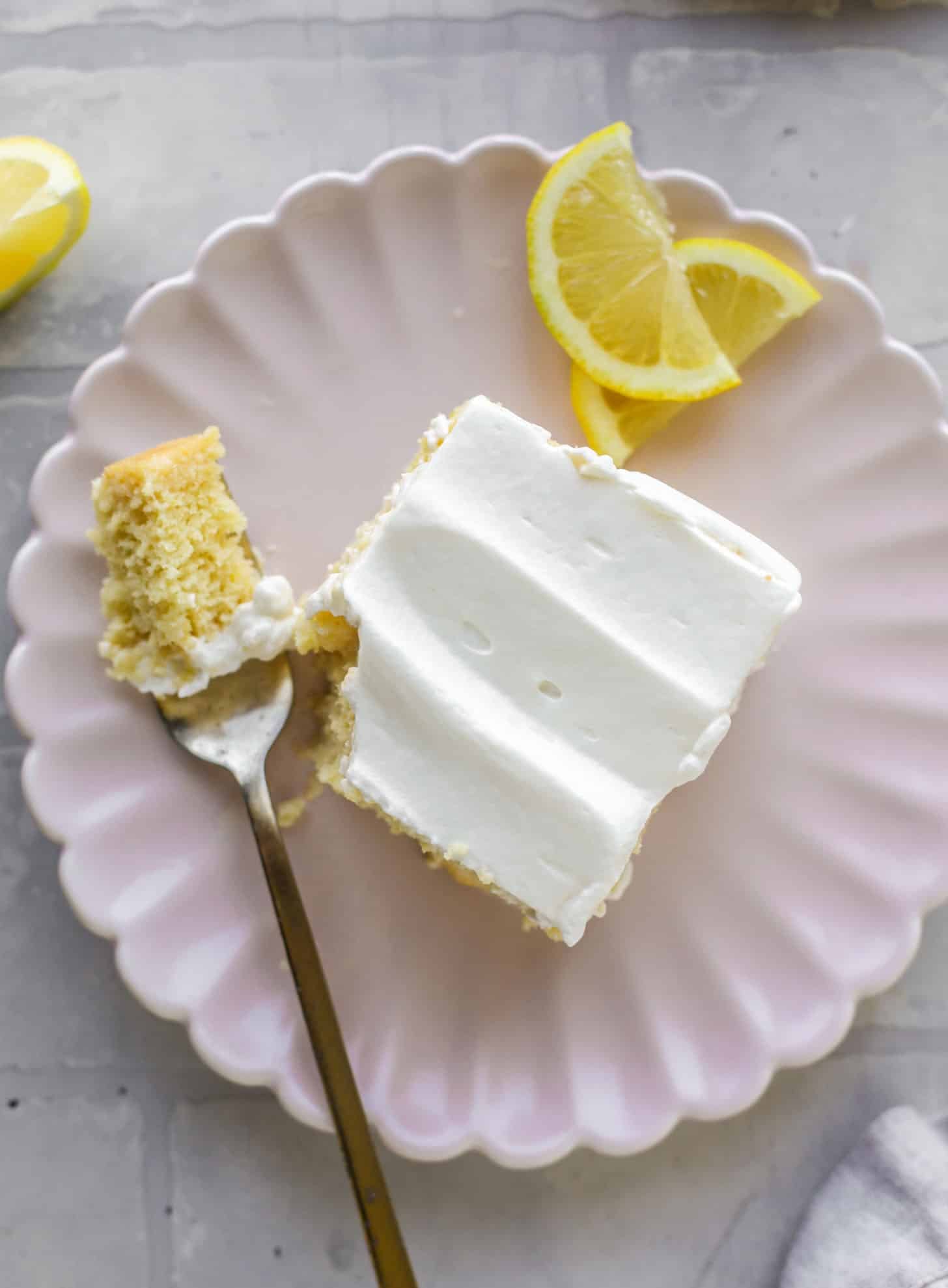 simple lemon tres leches cake with whipped cream
