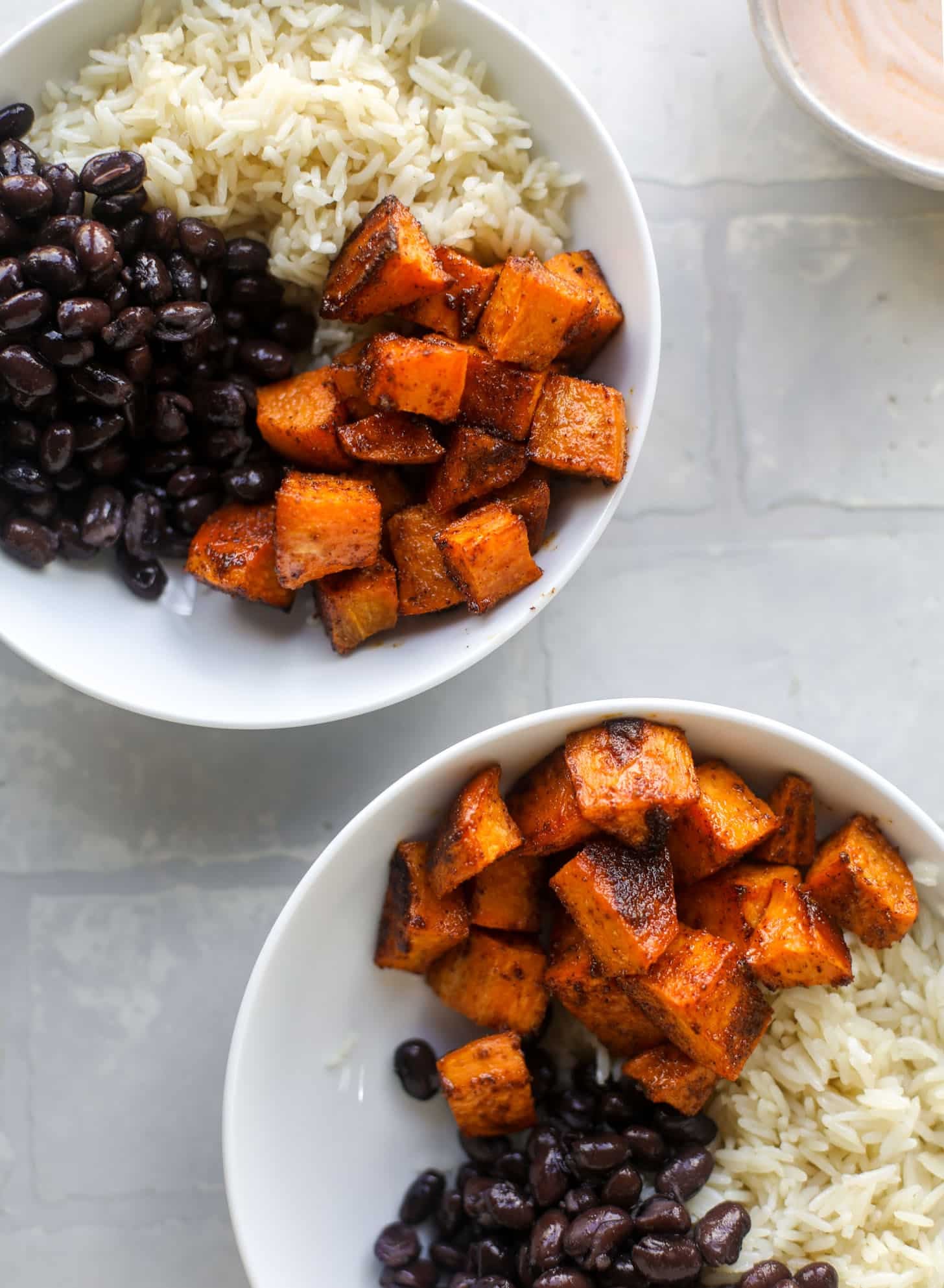 sweet potatoes, black beans and rice in a bowl