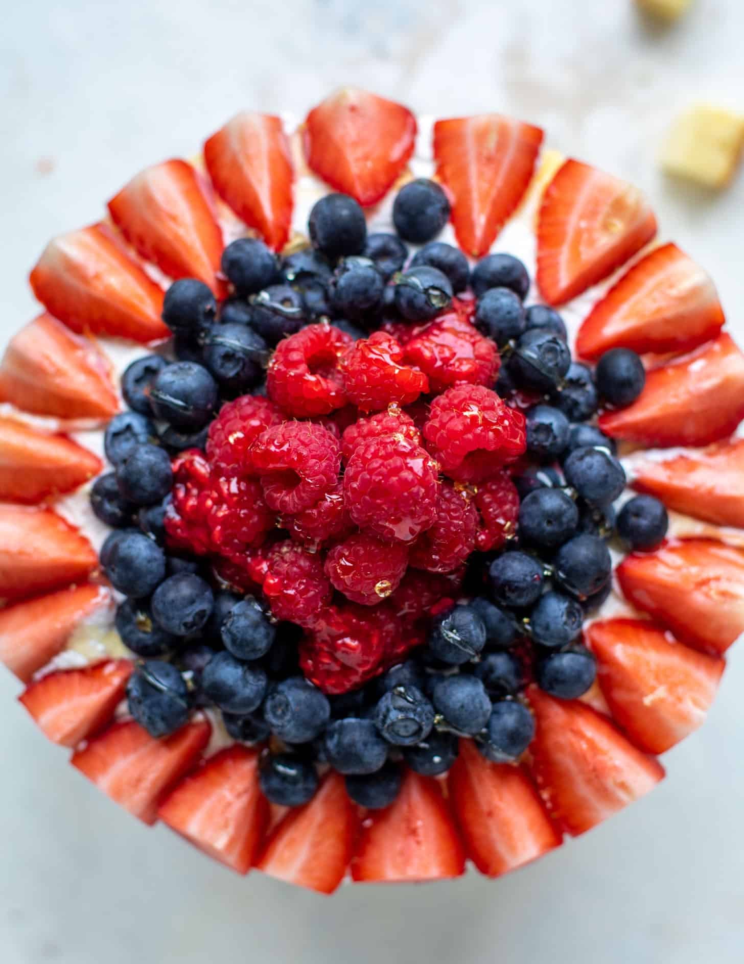 triple berry trifle with raspberry sauce