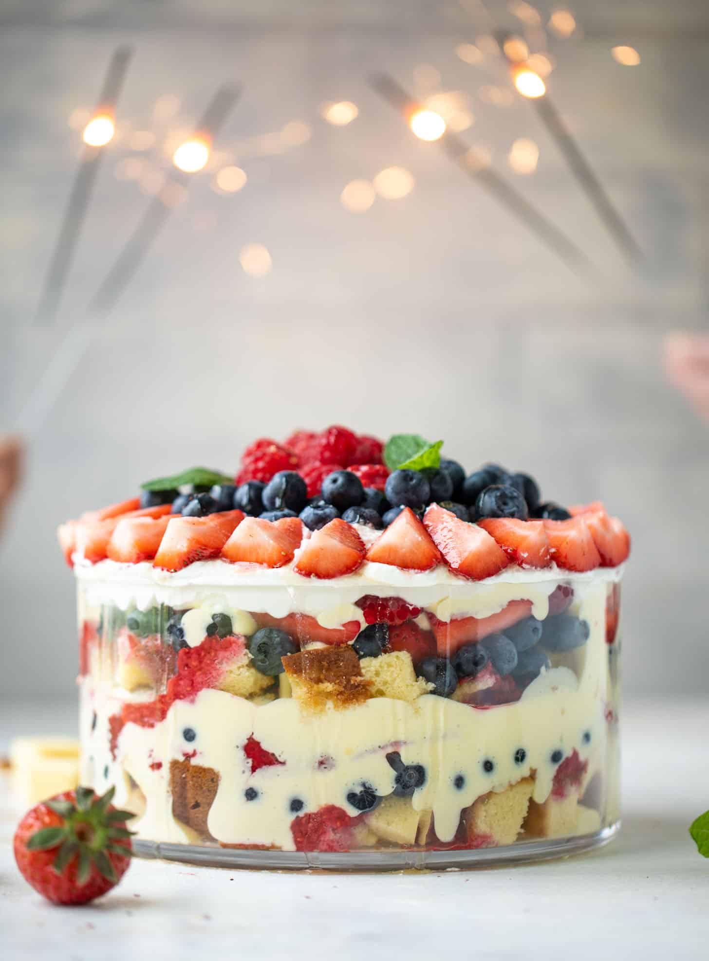 red white and blue berry trifle with raspberry sauce