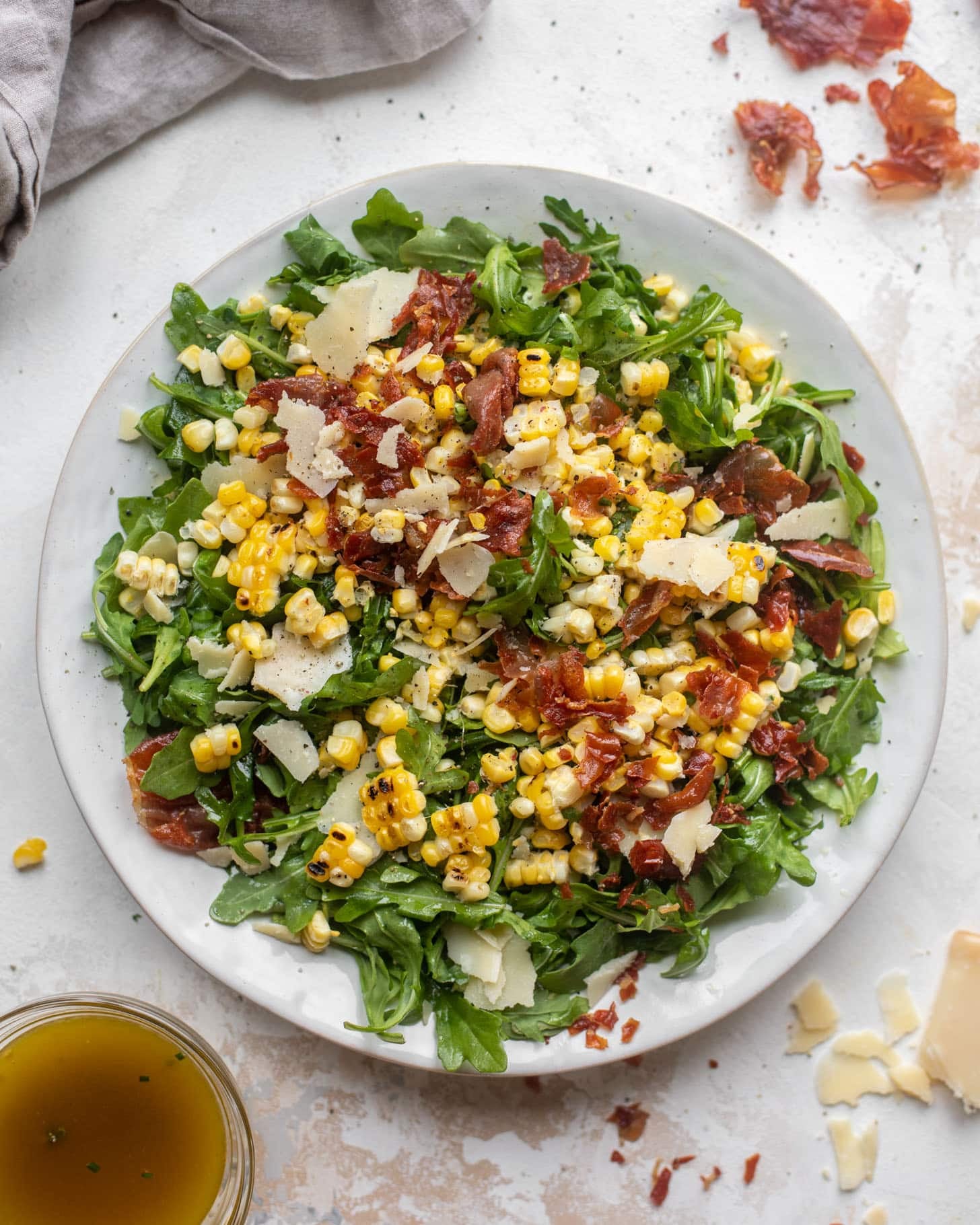 crispy prosciutto & charred corn arugula salad