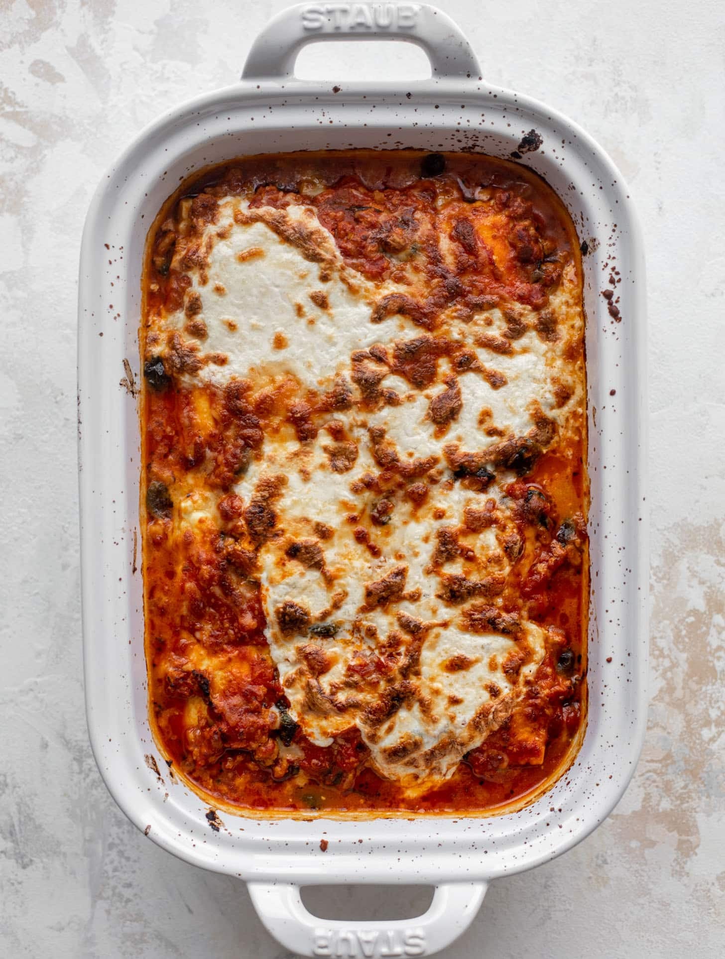 baked ravioli with spinach out of the oven
