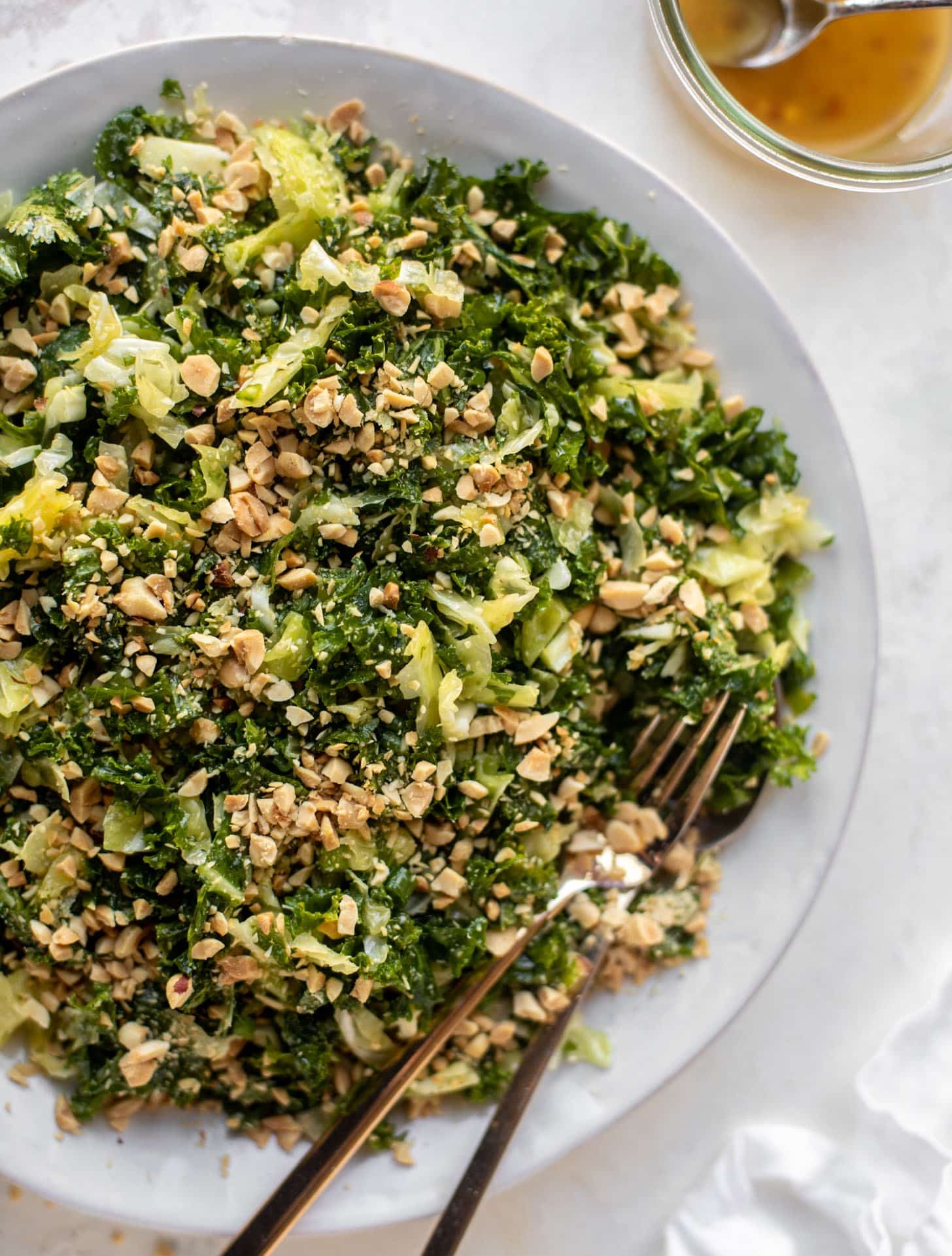 crunchy emerald kale salad with peanut vinaigrette