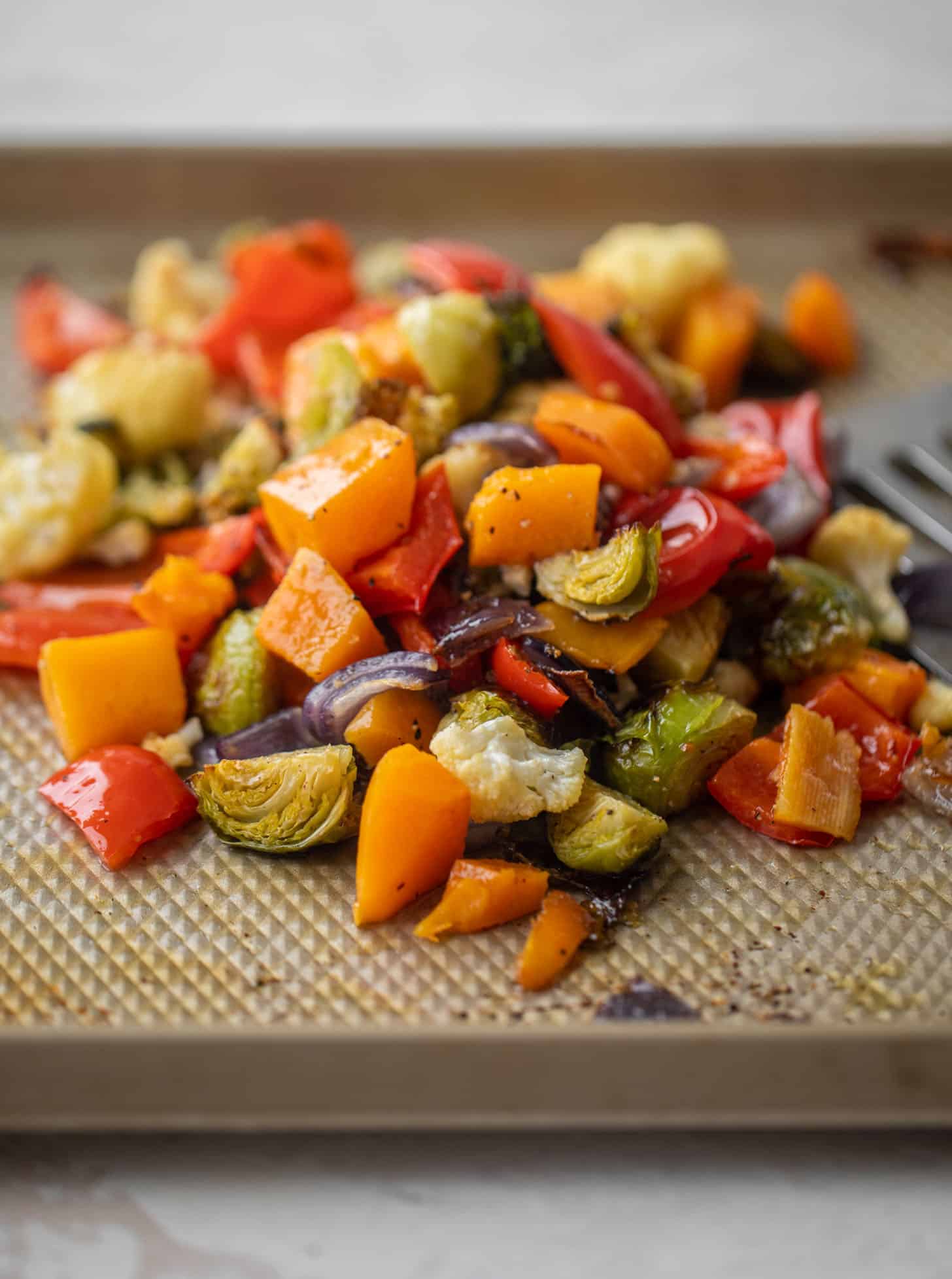 roasted vegetables on a baking sheet