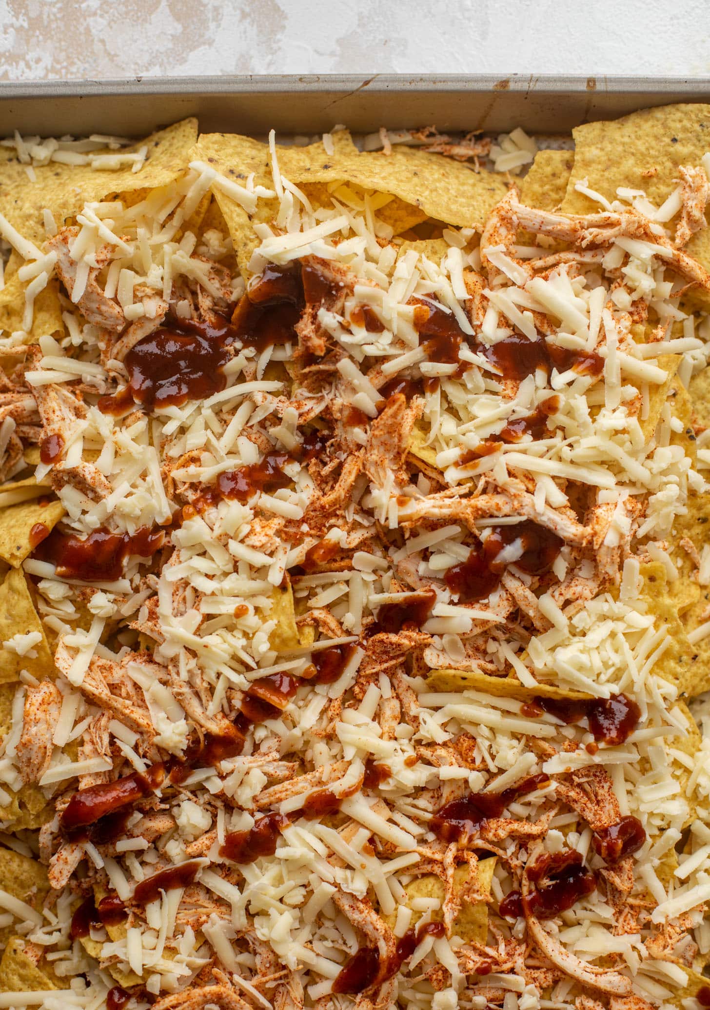 chips with chicken, cheese, bbq sauce