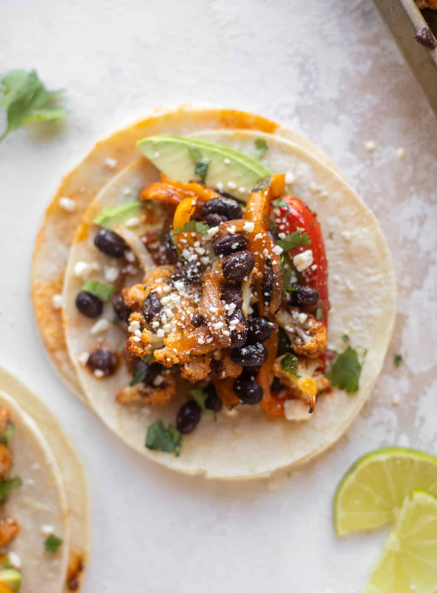cauliflower and black bean sheet pan fajitas