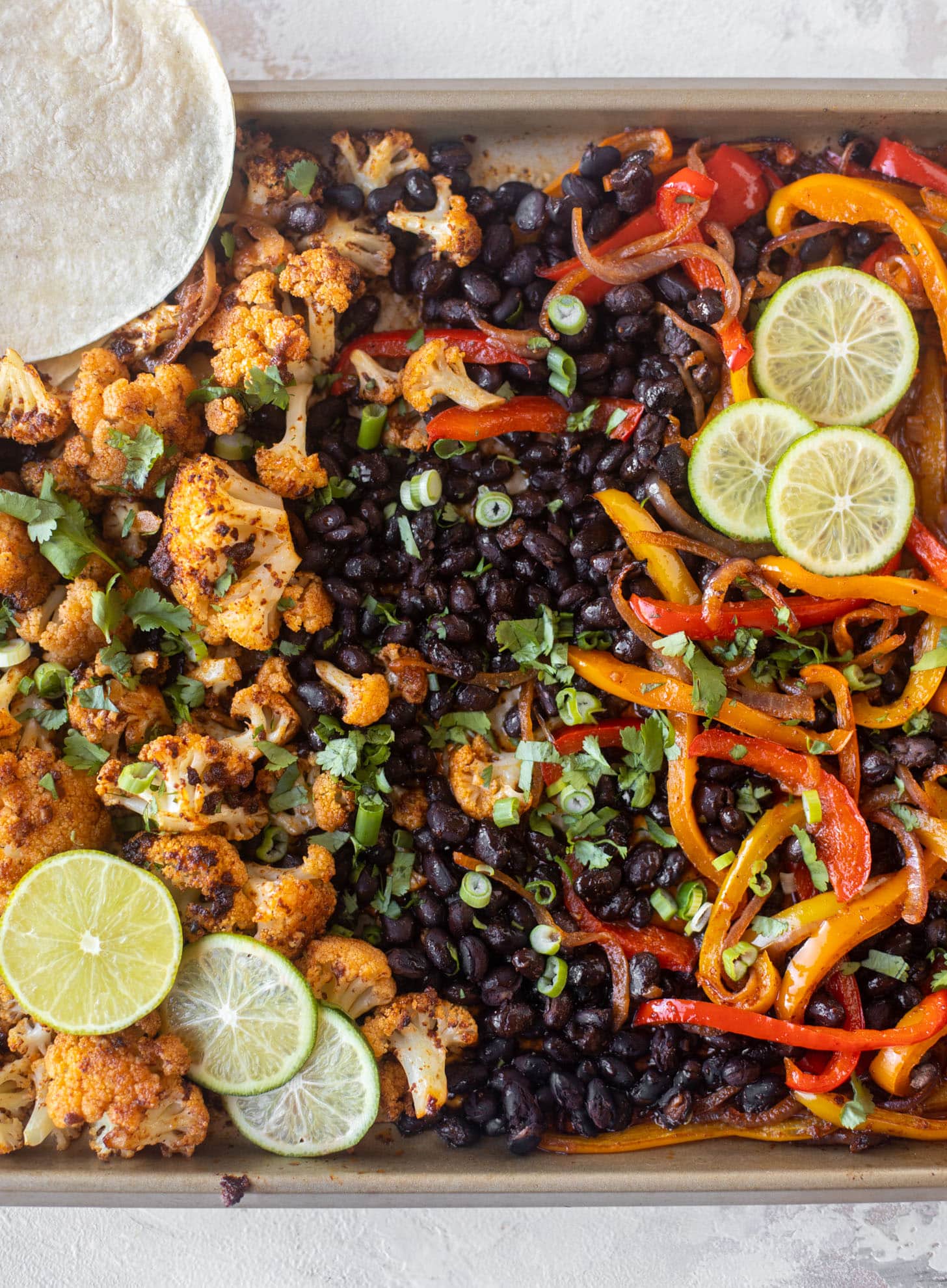 cauliflower and black bean sheet pan fajitas