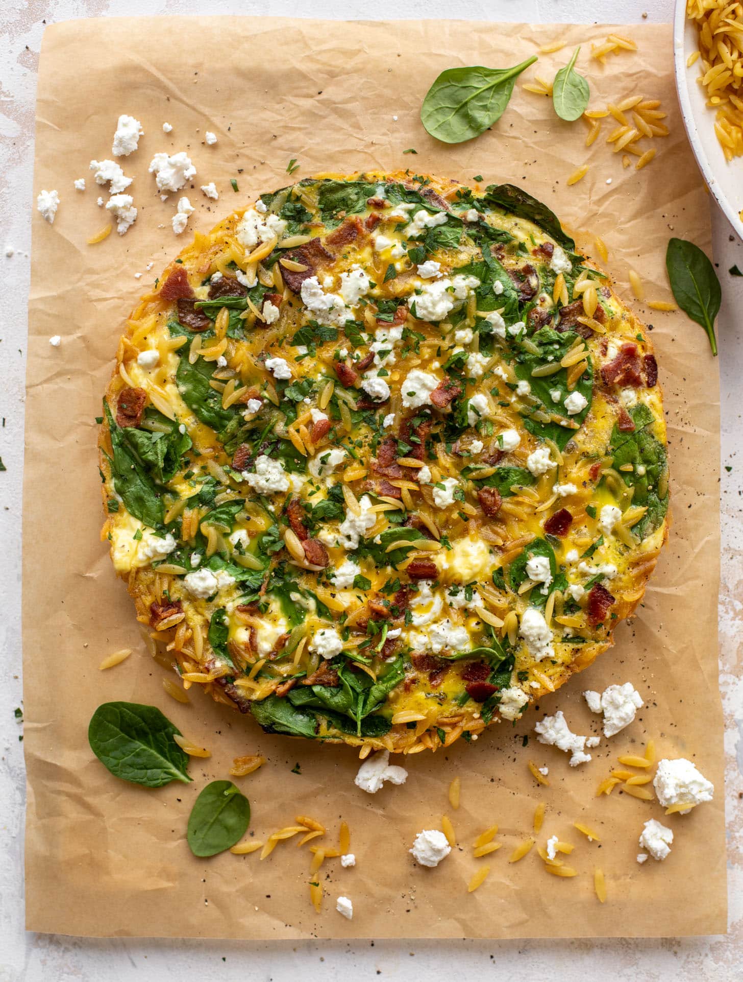 crispy orzo frittata with bacon and goat cheese