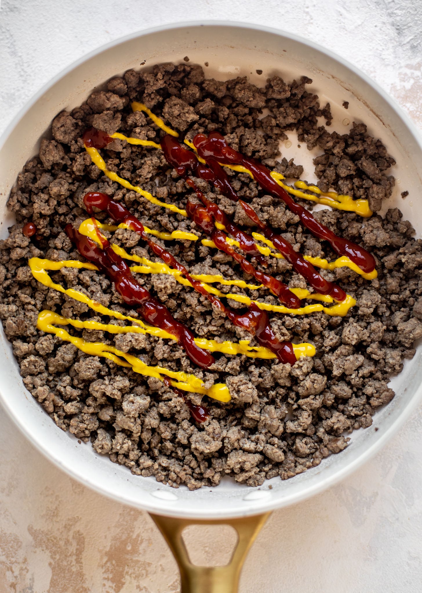 ground beef with ketchup and mustard