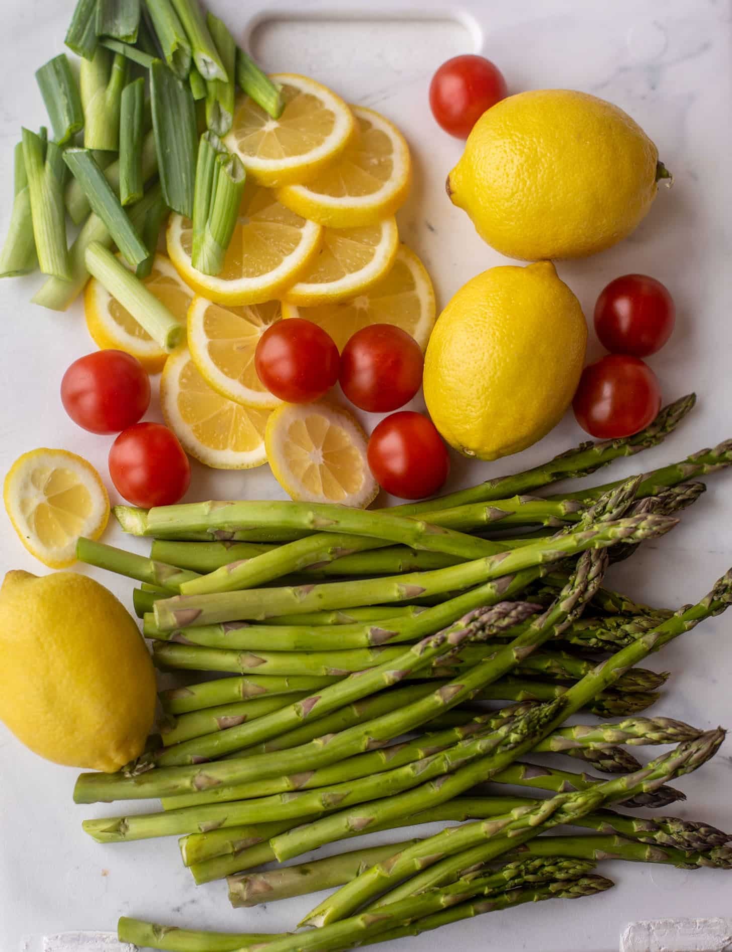 asparagus, lemon, tomatoes