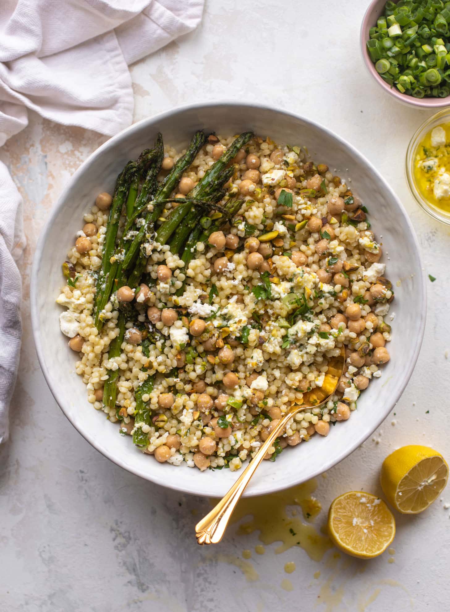 spring couscous bowls with lemon feta vinaigrette