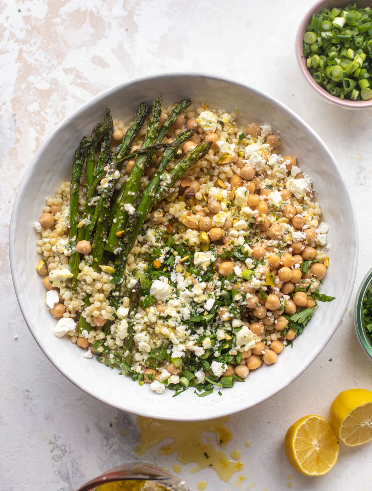 spring couscous bowls with lemon feta vinaigrette