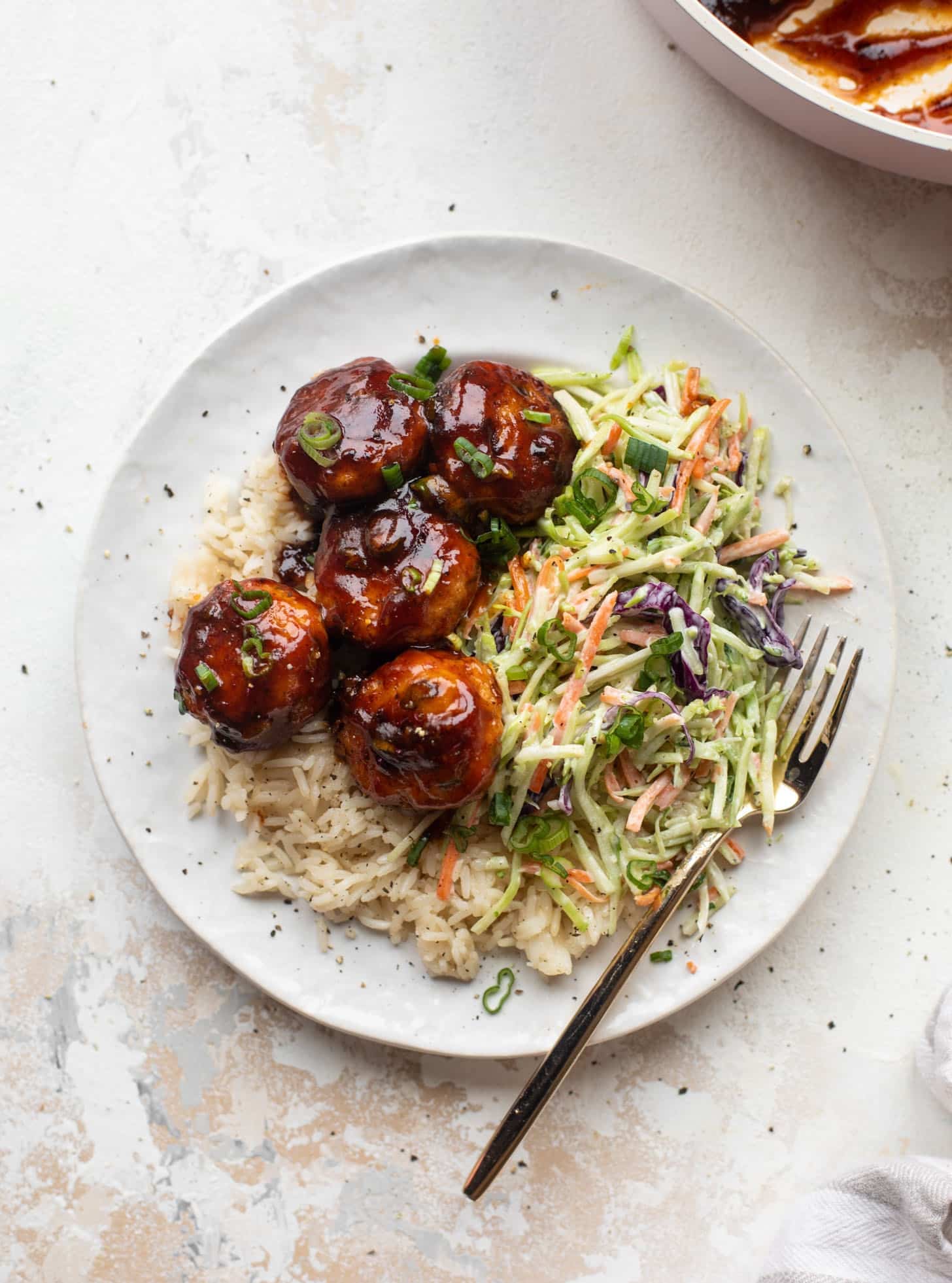 sticky BBQ chicken meatballs with broccoli slaw