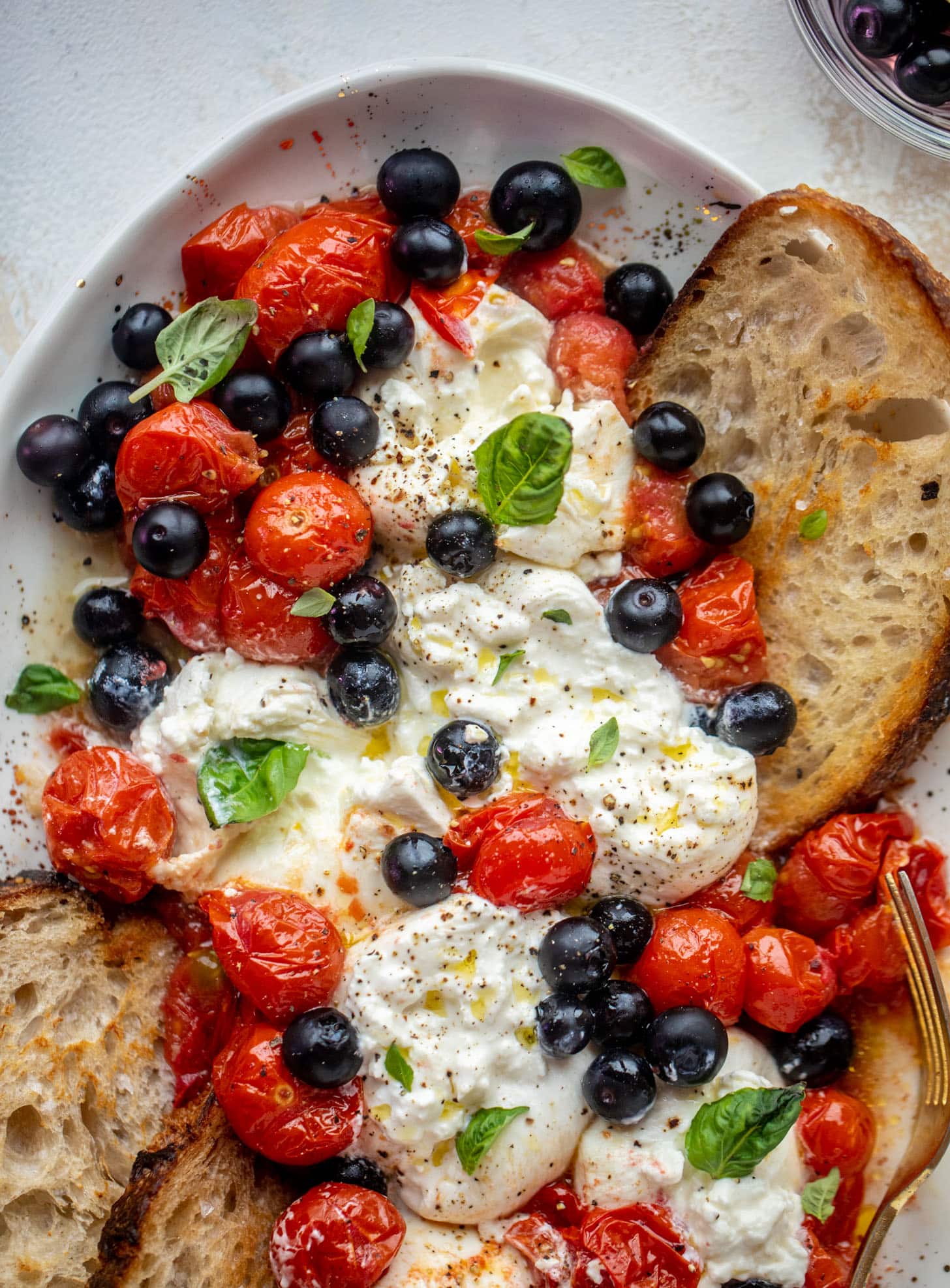 red white and pickled blueberry burrata platter