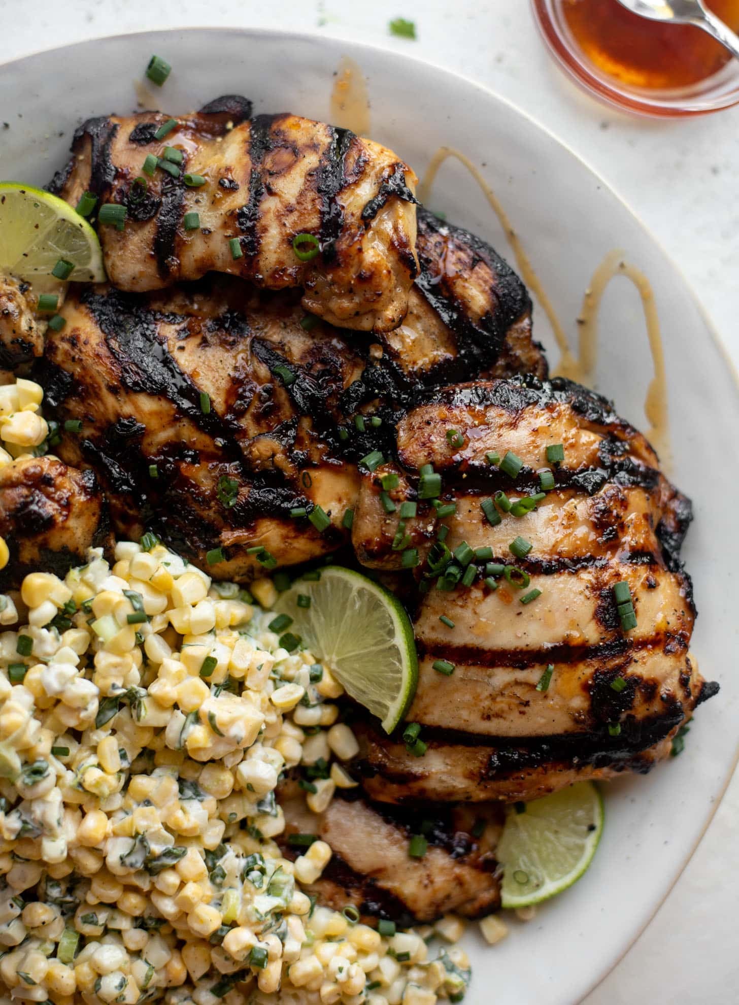 grilled hot honey chicken with lime corn salad