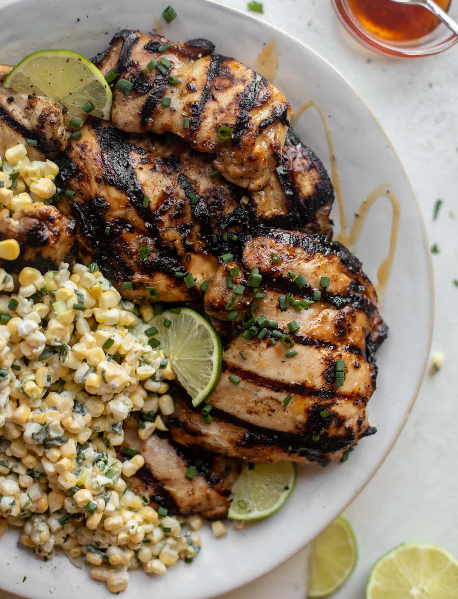 grilled hot honey chicken with lime corn salad