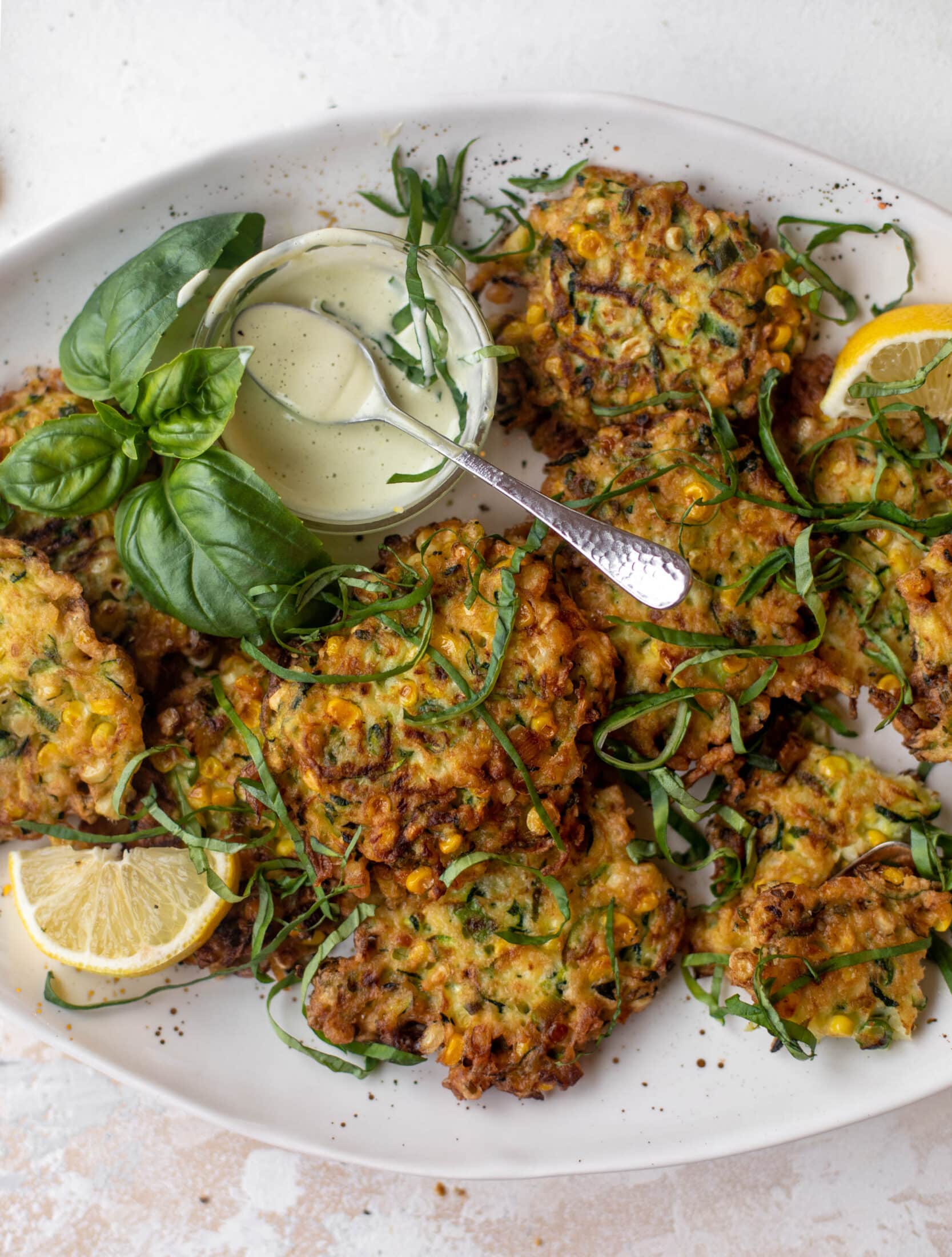 zucchini corn fritters with lemon basil aioli