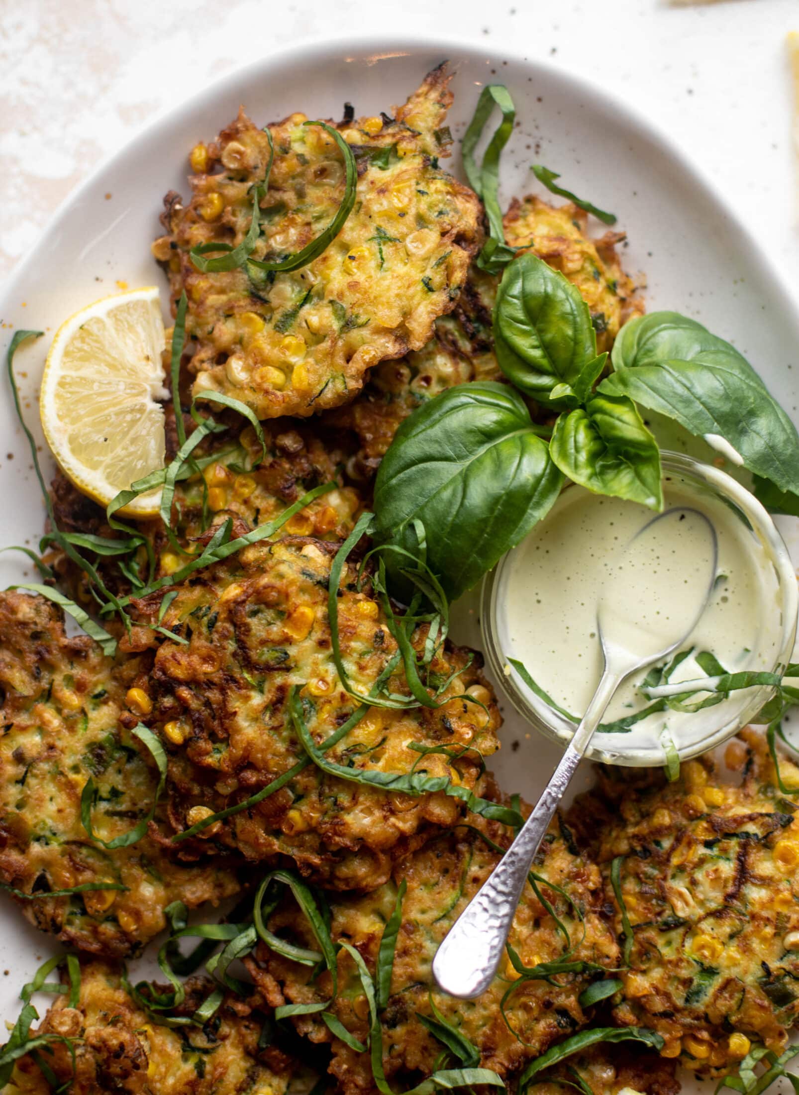 zucchini corn fritters with lemon basil aioli