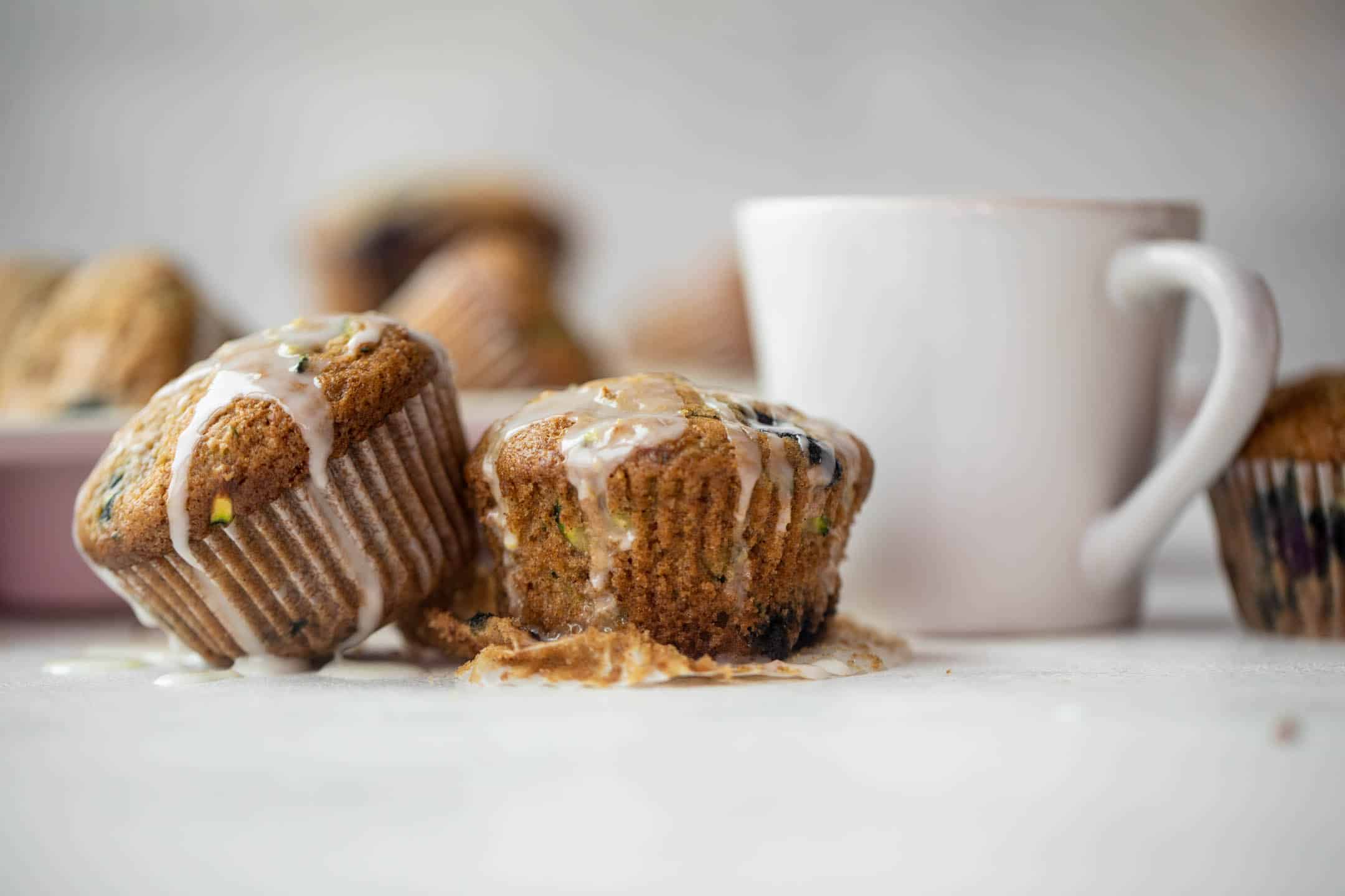 blueberry zucchini muffins with lemon glaze