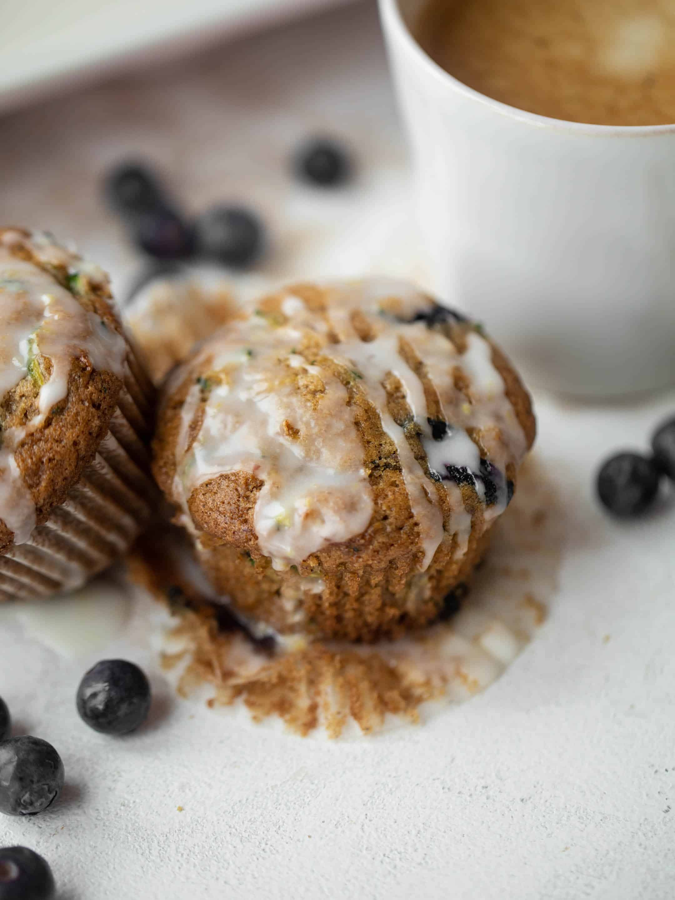 blueberry zucchini muffins with lemon glaze