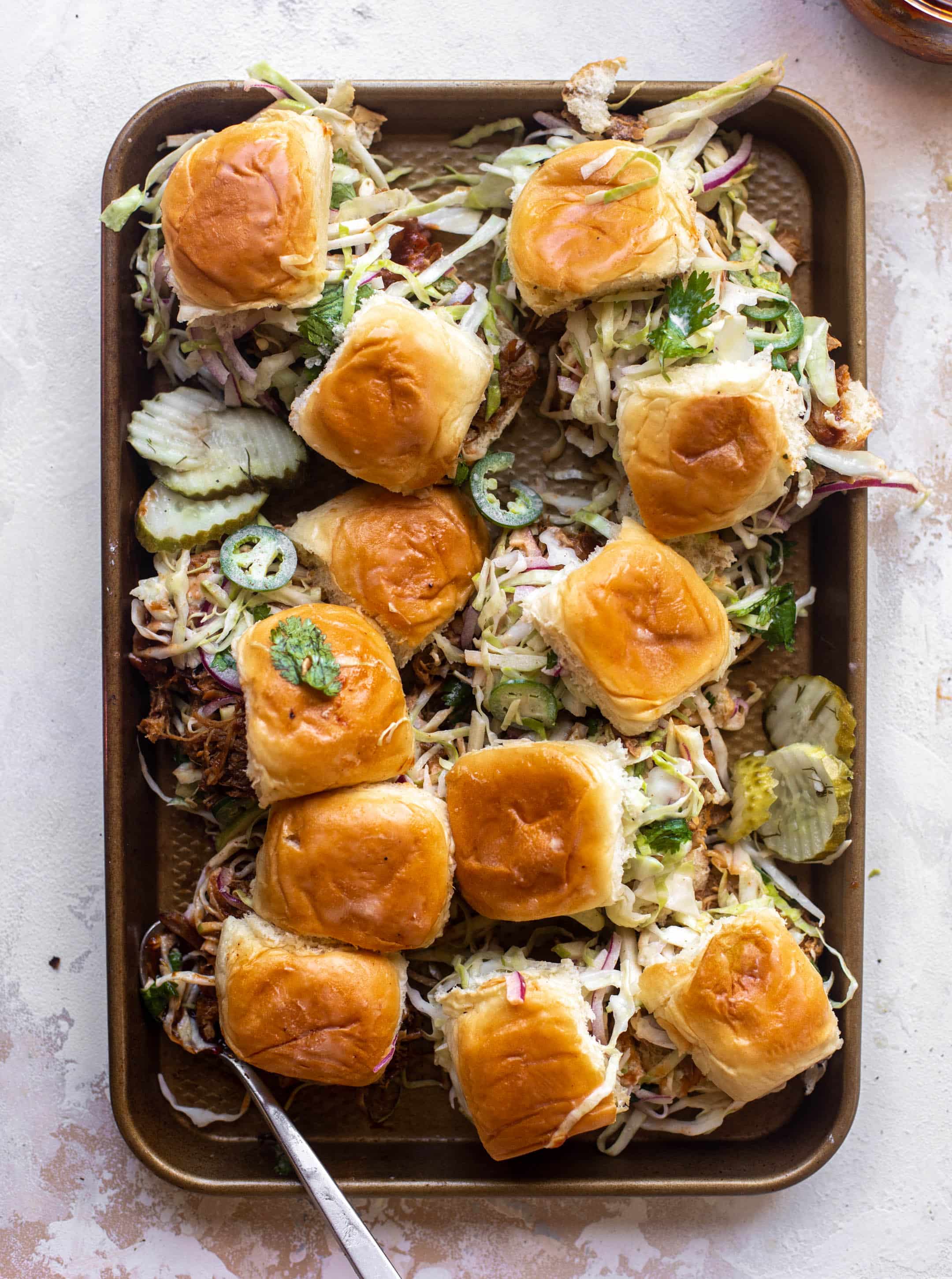 root beer pulled pork sliders with jalapeño slaw