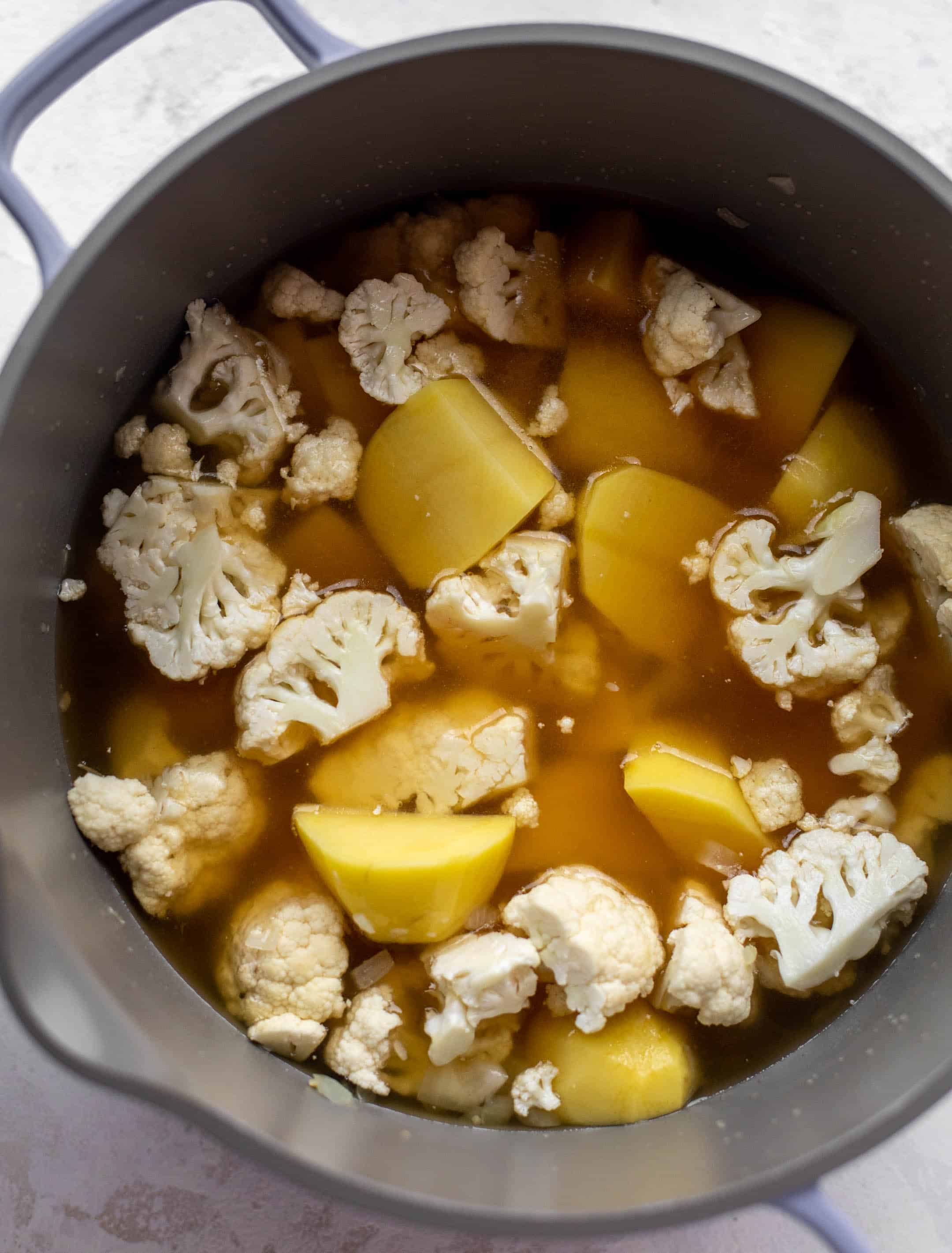 cauliflower and potatoes in stock