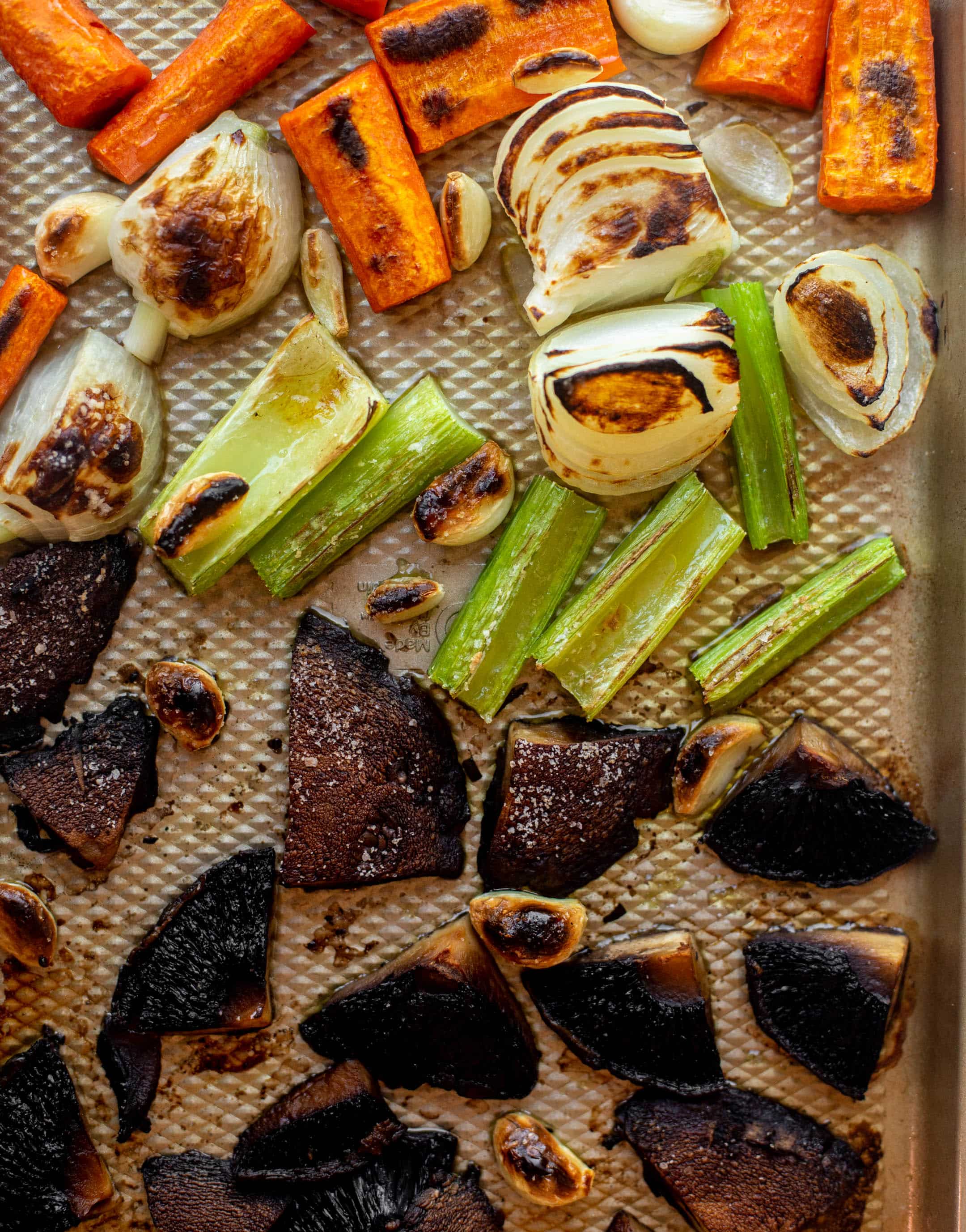 roasted vegetables on a sheet pan