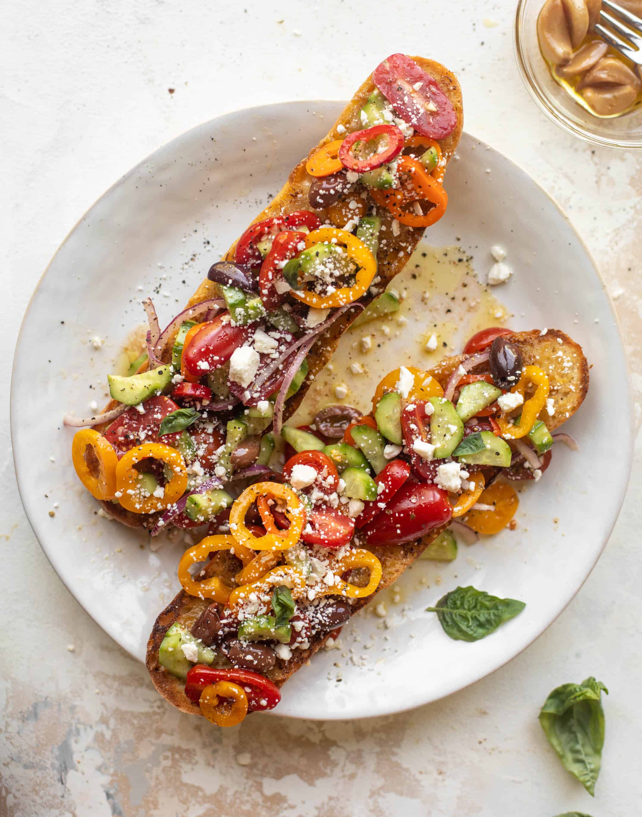 grilled garlic baguettes with greek salad