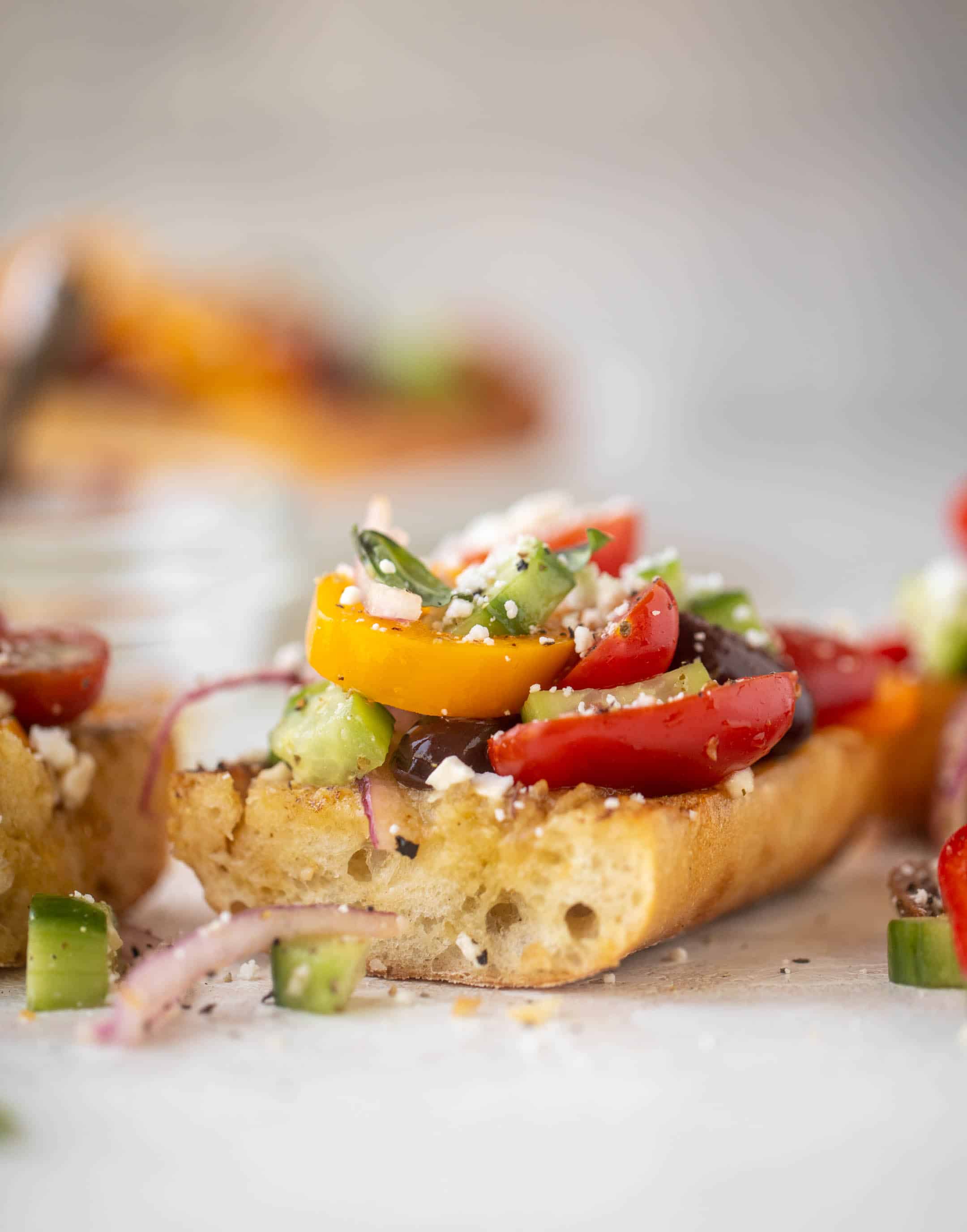 grilled garlic baguettes with greek salad