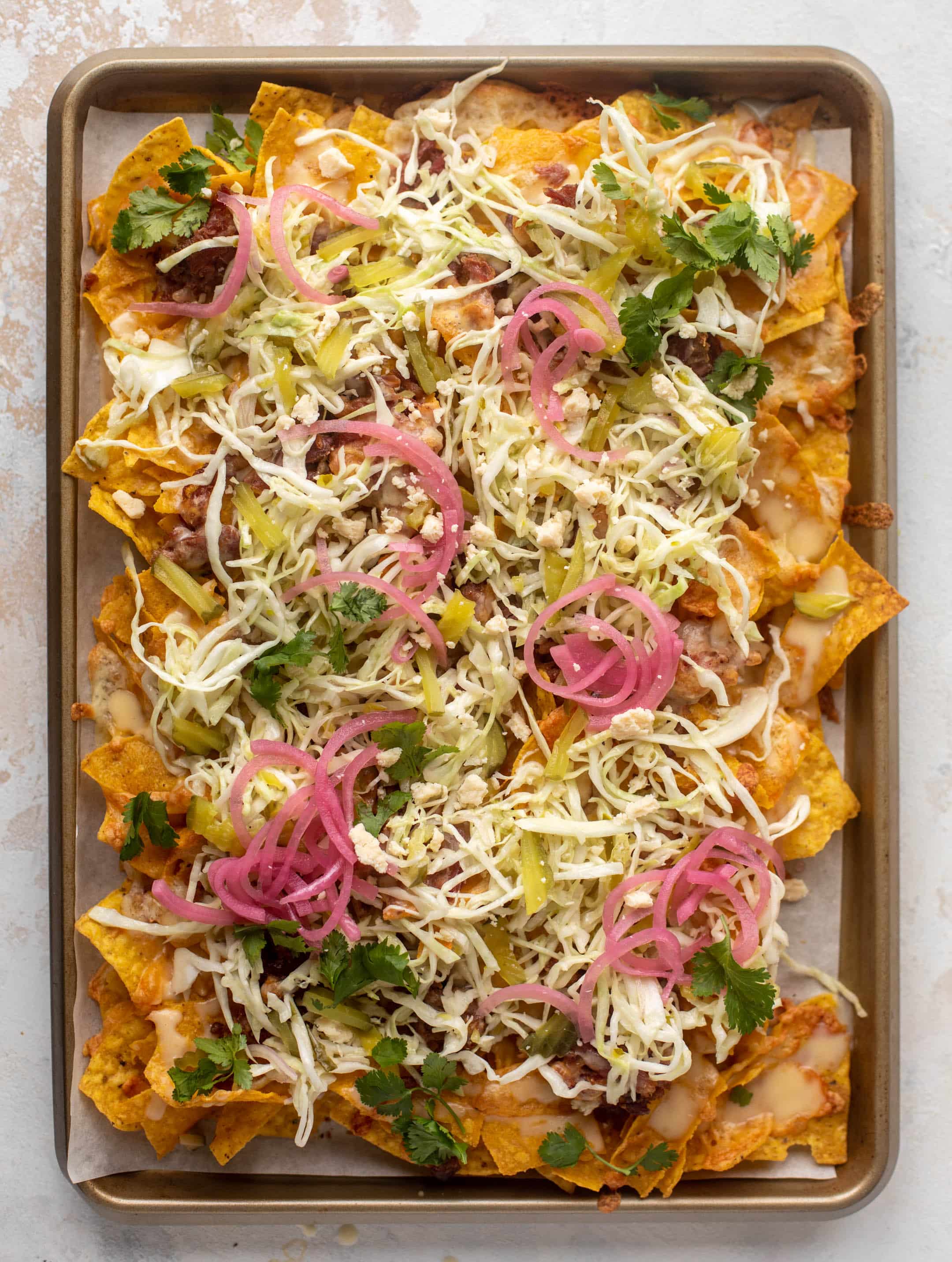 pulled pork nachos with pickle slaw