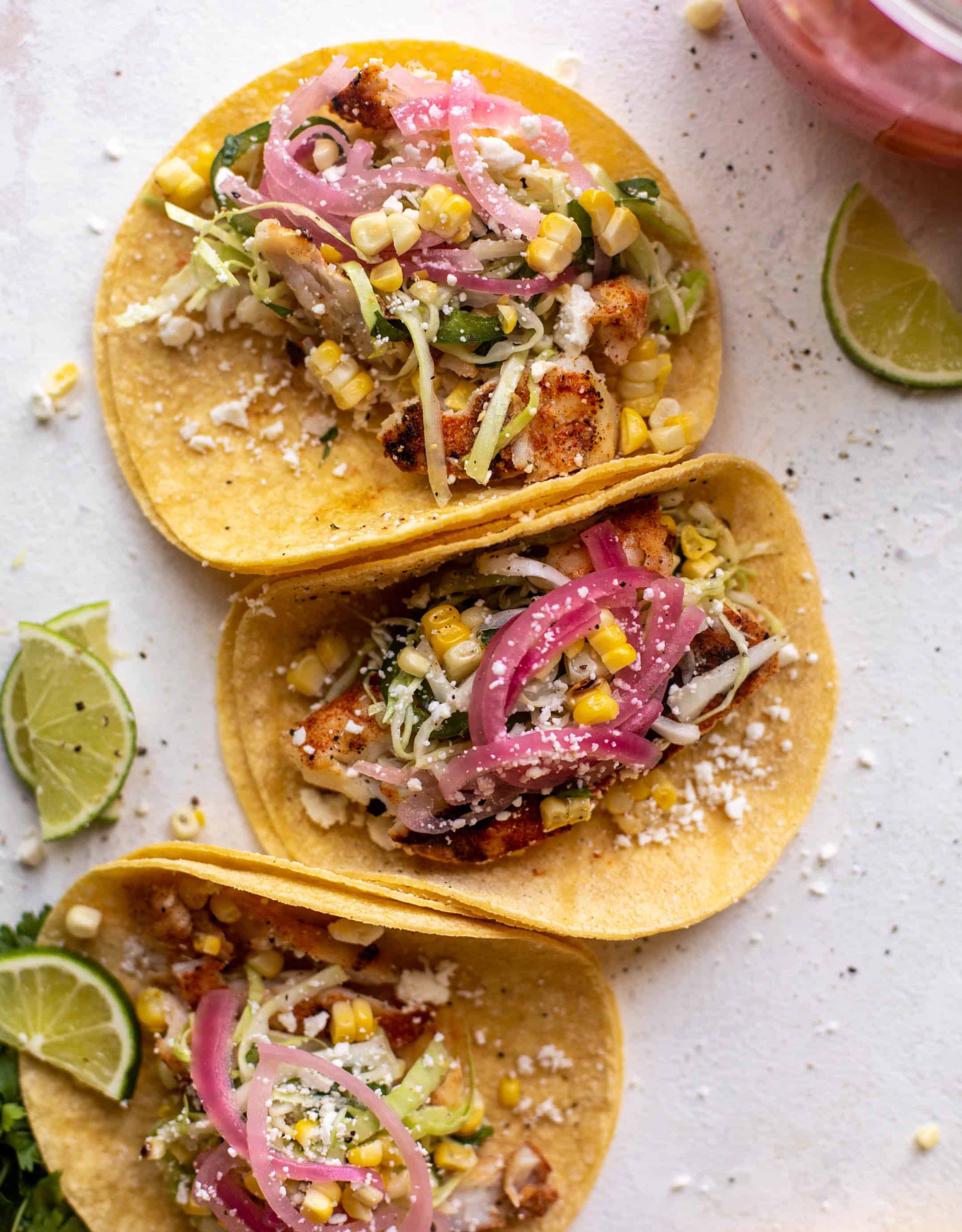 grilled fish tacos with jalapeño corn slaw