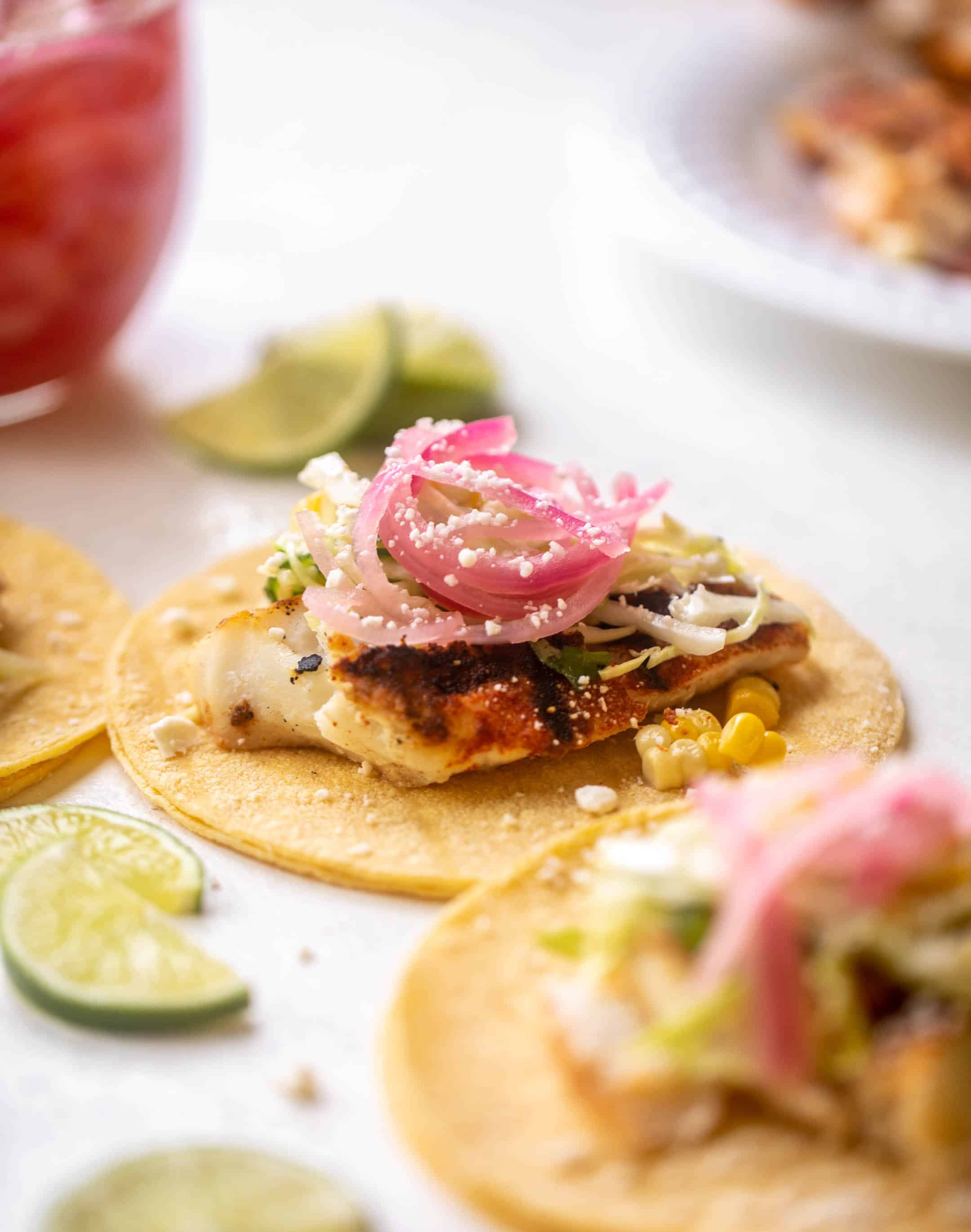 grilled fish tacos with jalapeño corn slaw