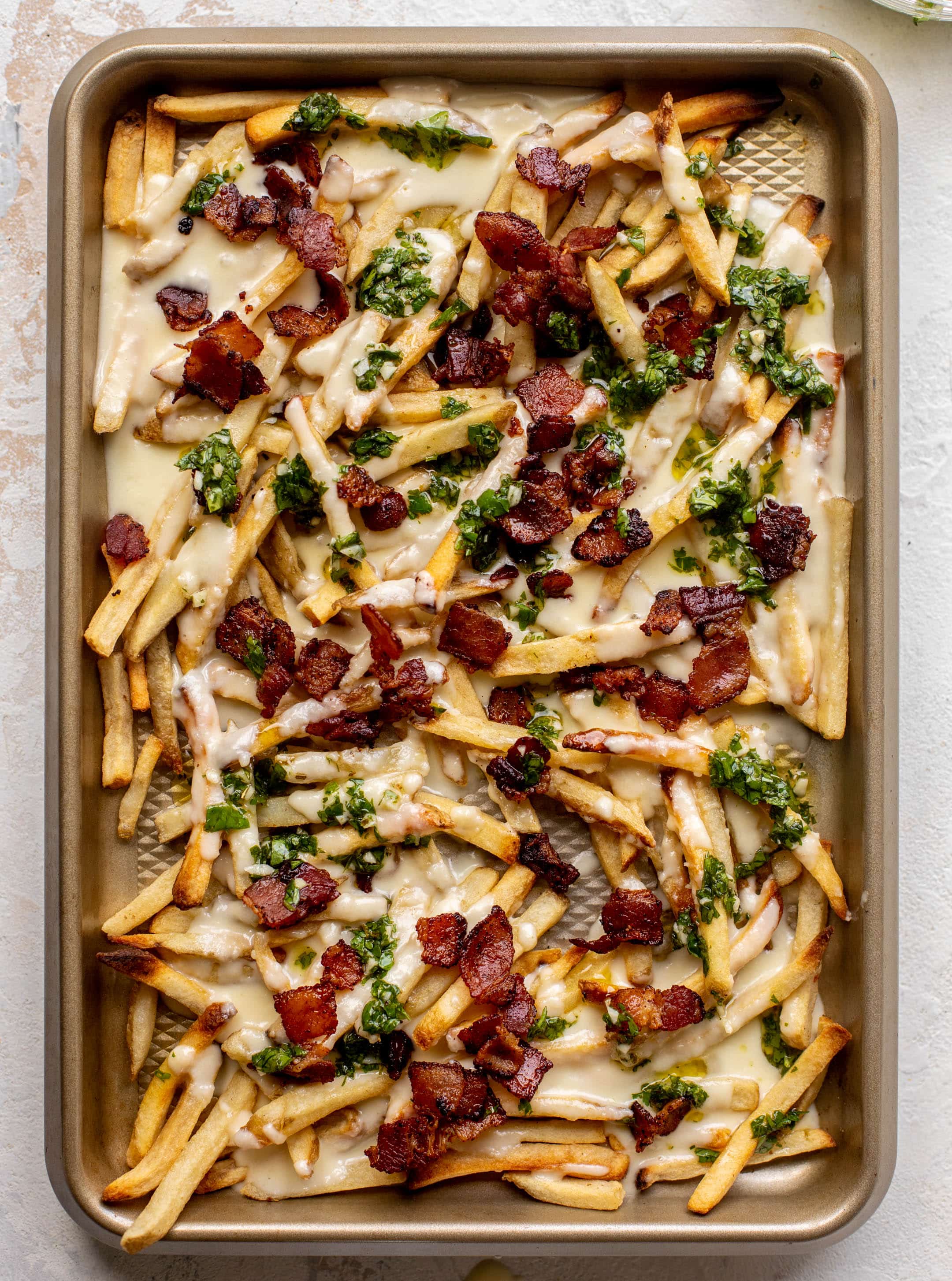 chimichurri cheese fries with chipotle bacon