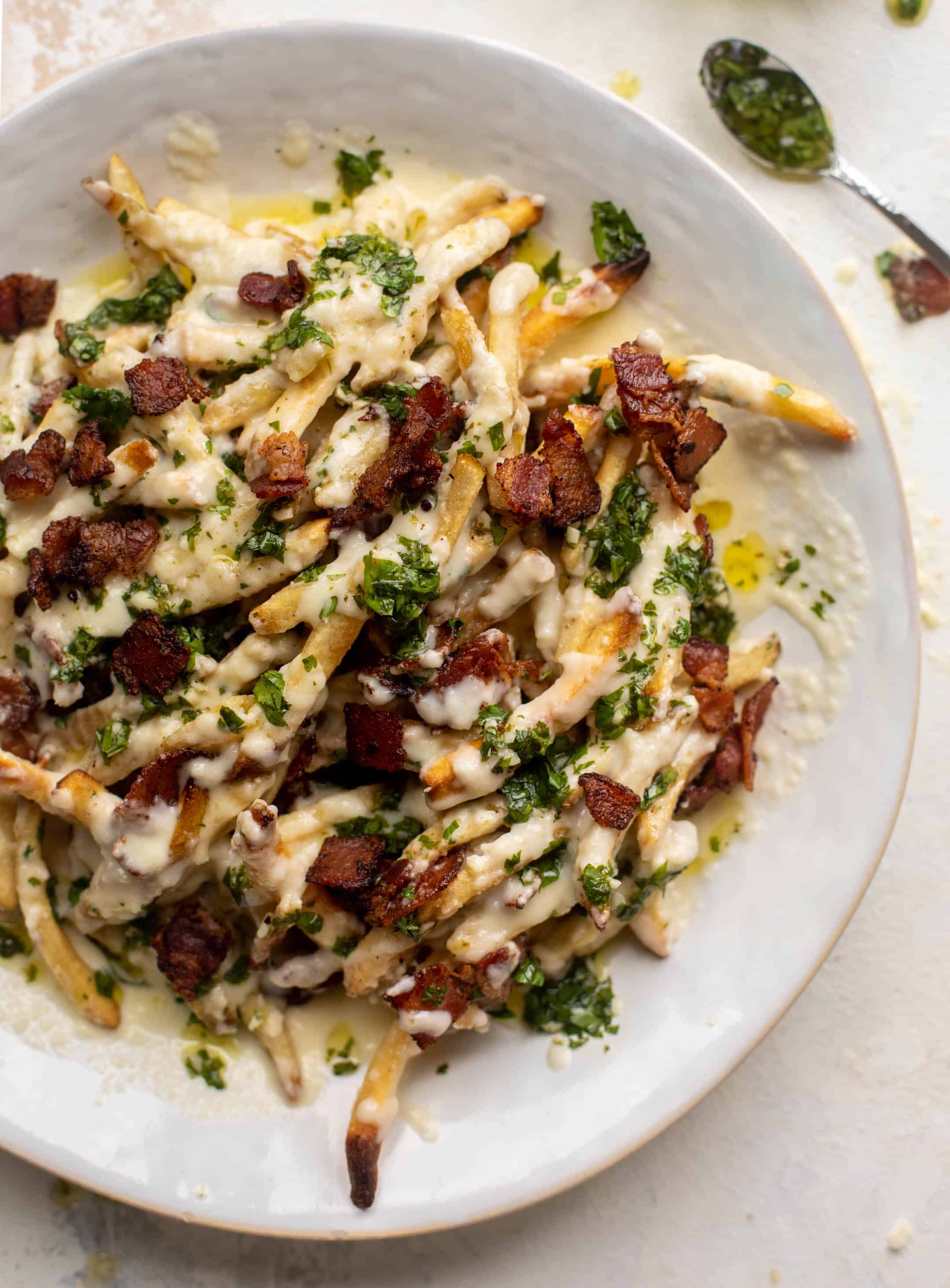 chimichurri cheese fries with chipotle bacon