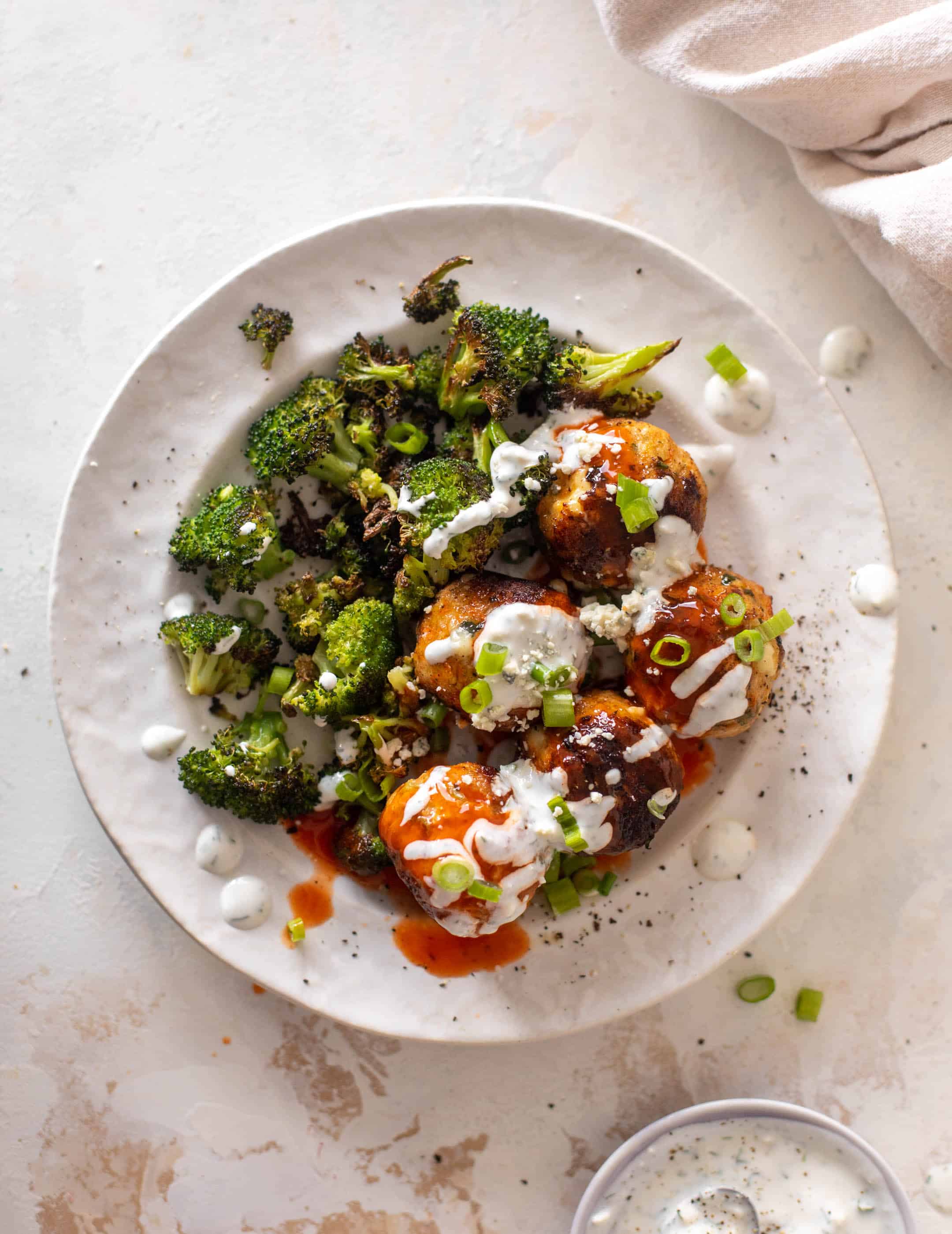 sheet pan buffalo chicken meatballs & broccoli