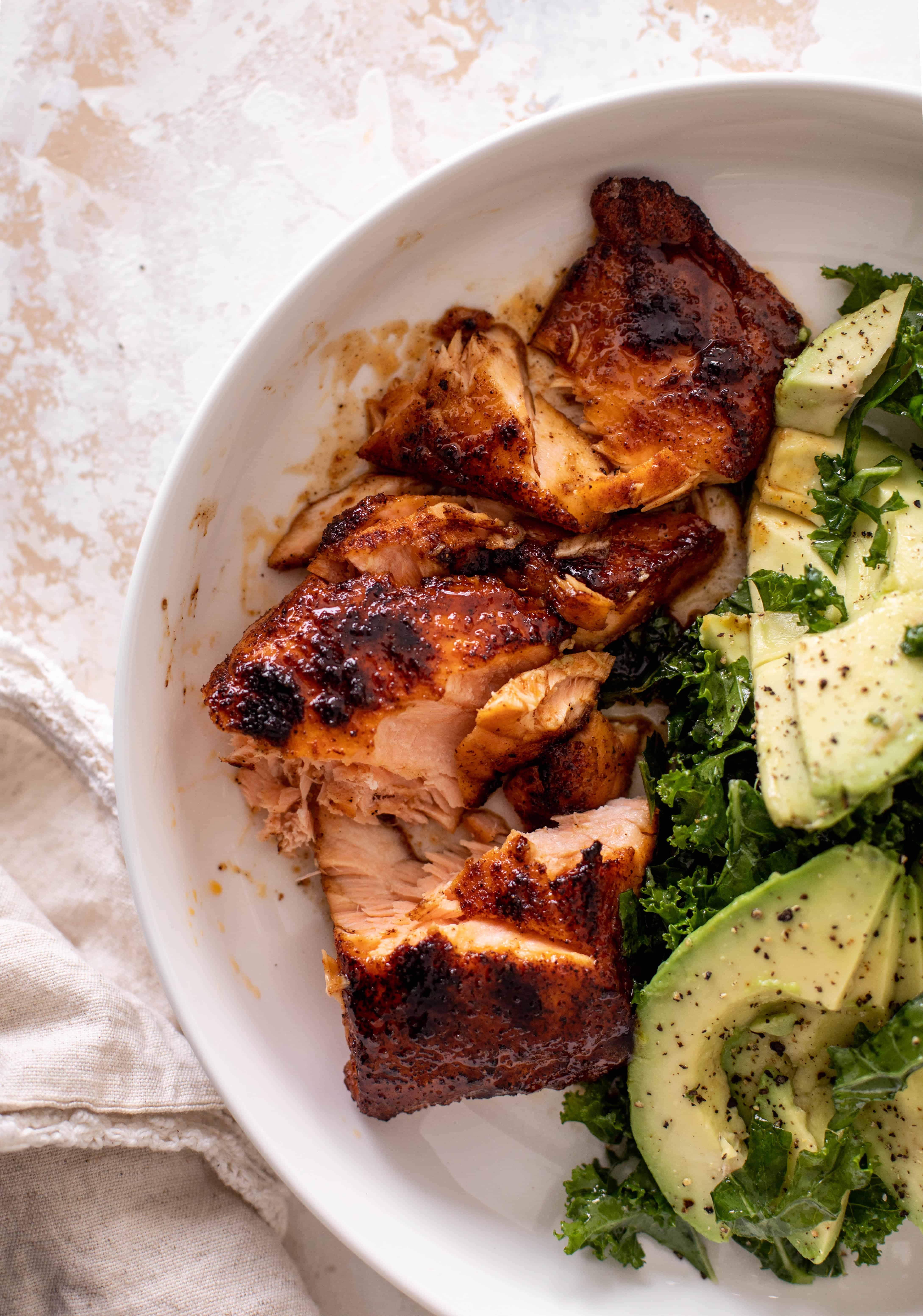 sticky salmon with avocado greens