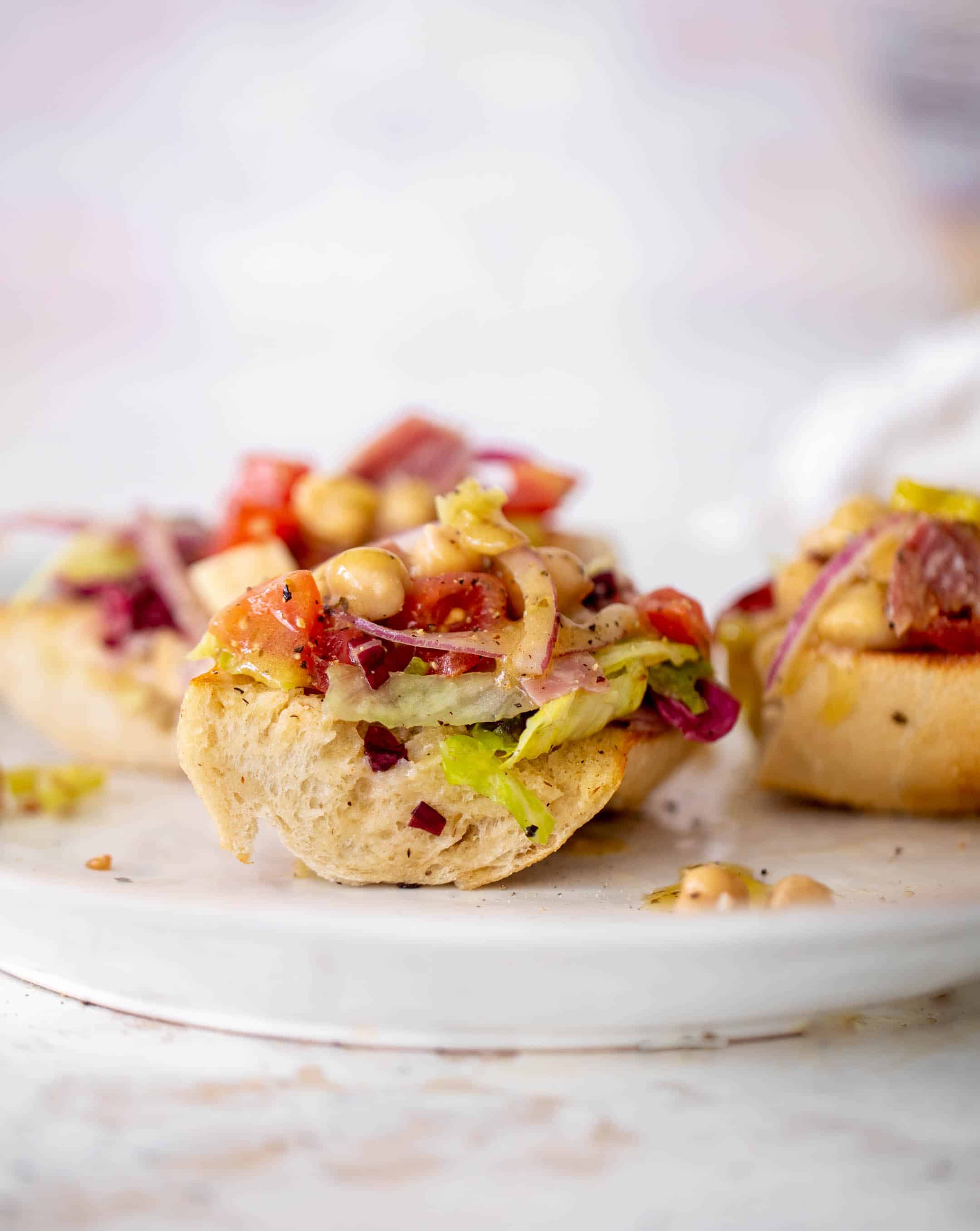 italian chopped salad on garlic bread