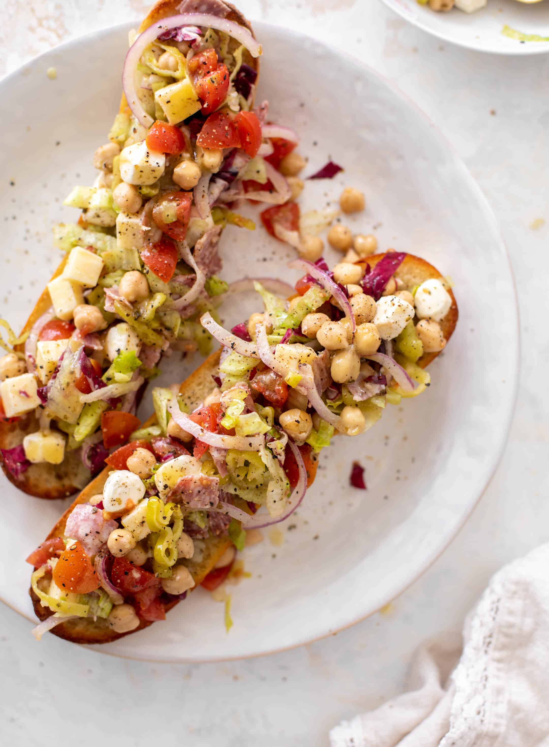 italian chopped salad on garlic bread
