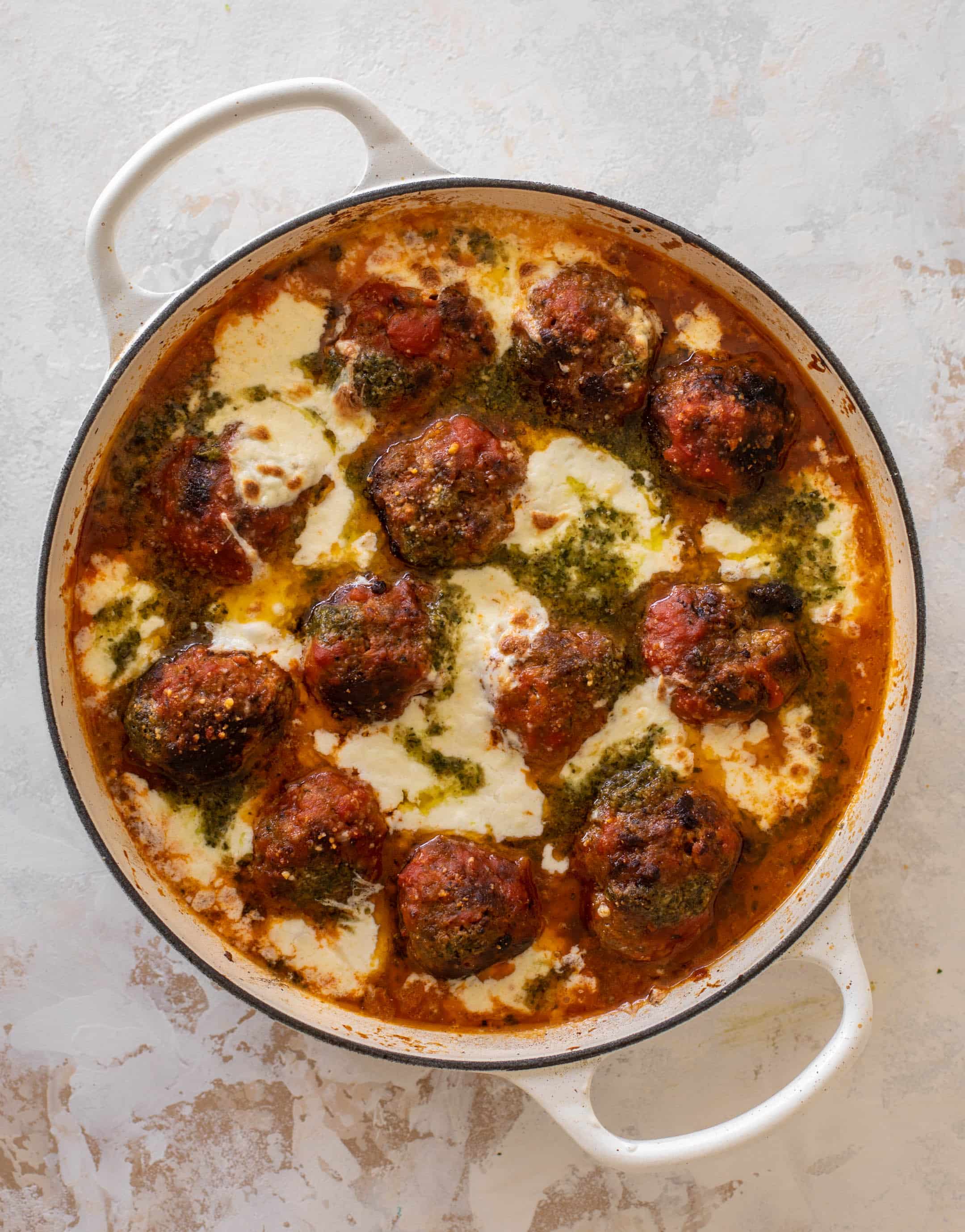 cheesy baked pesto meatballs with burrata