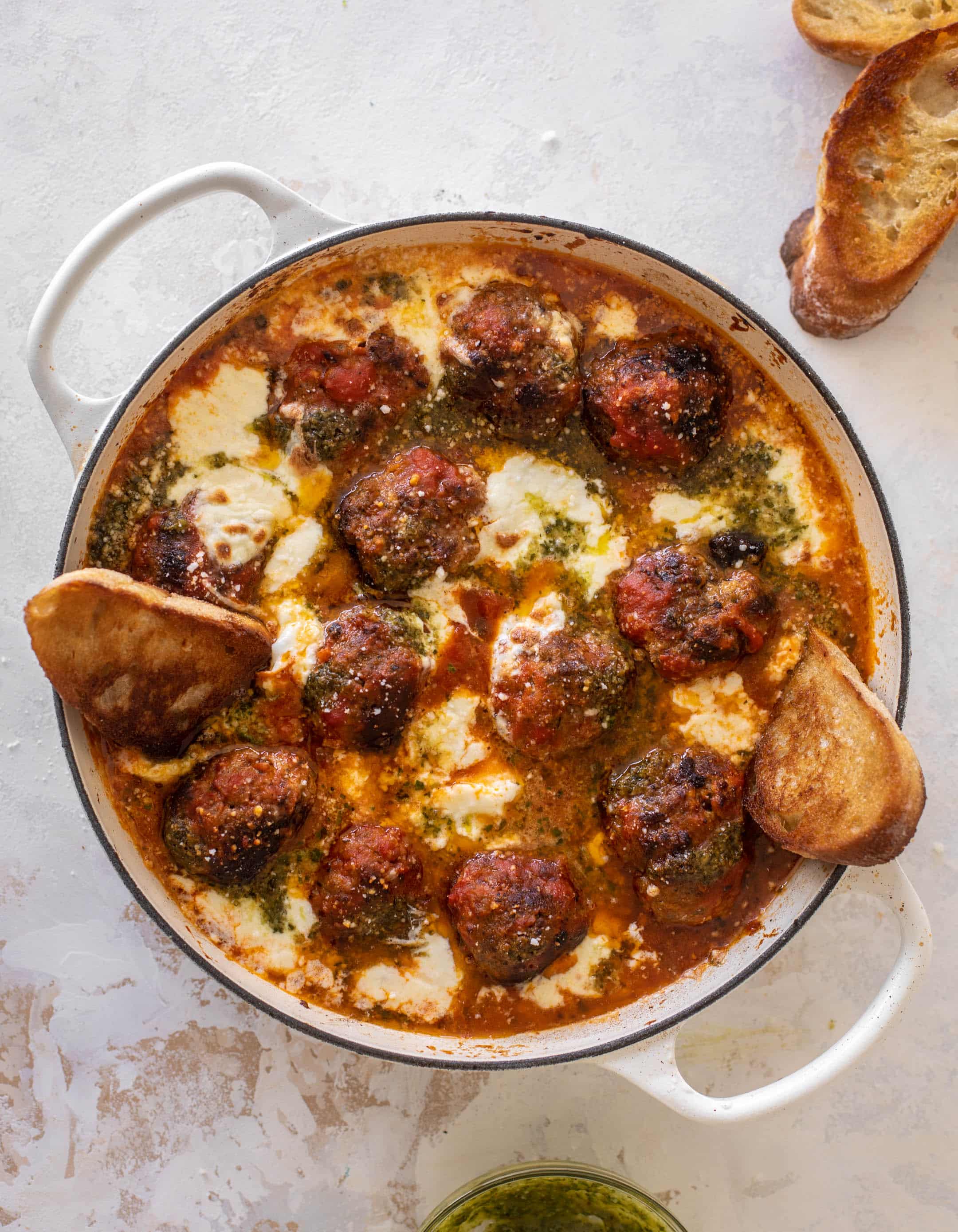 cheesy baked pesto meatballs with burrata