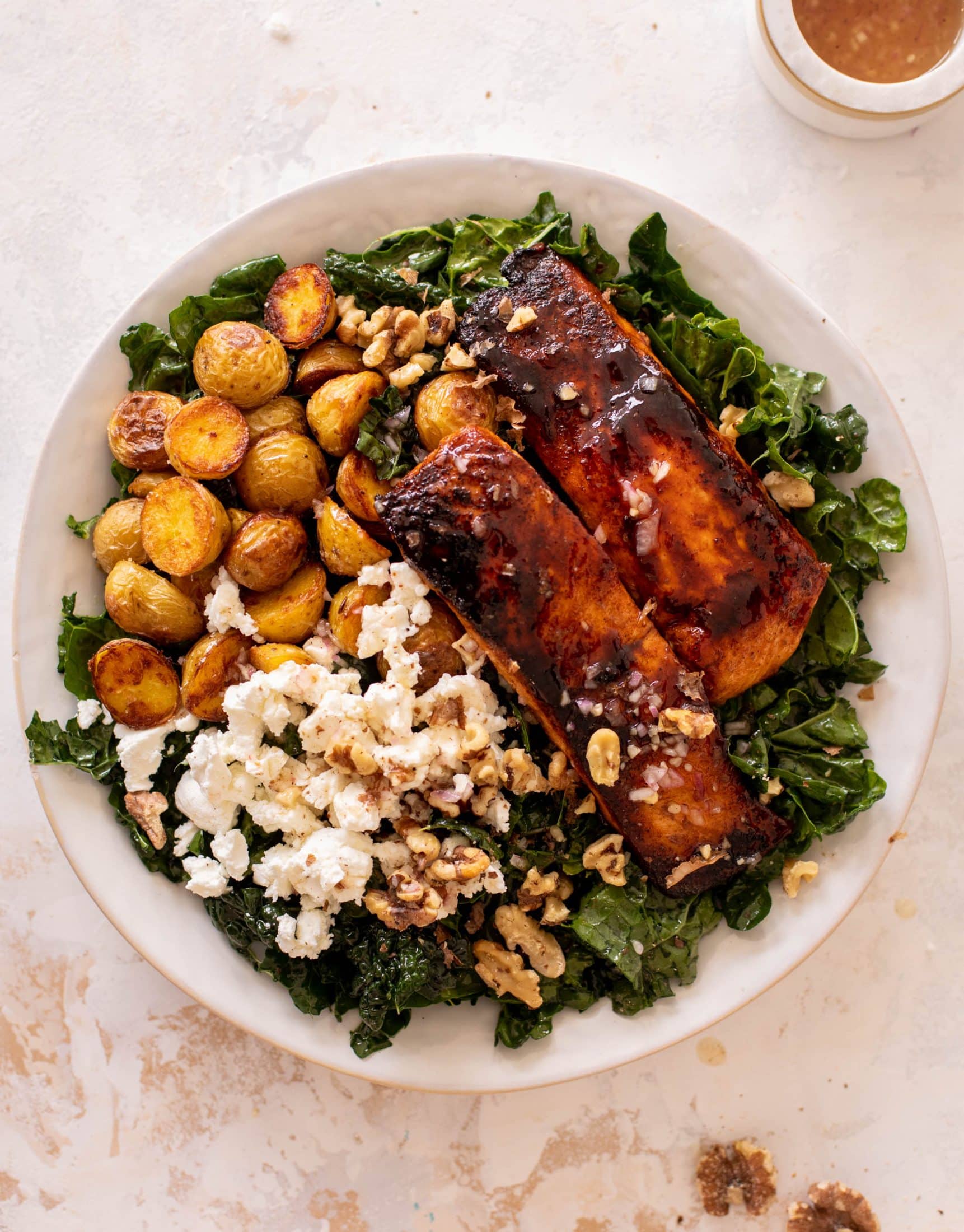 sticky cider salmon kale salad