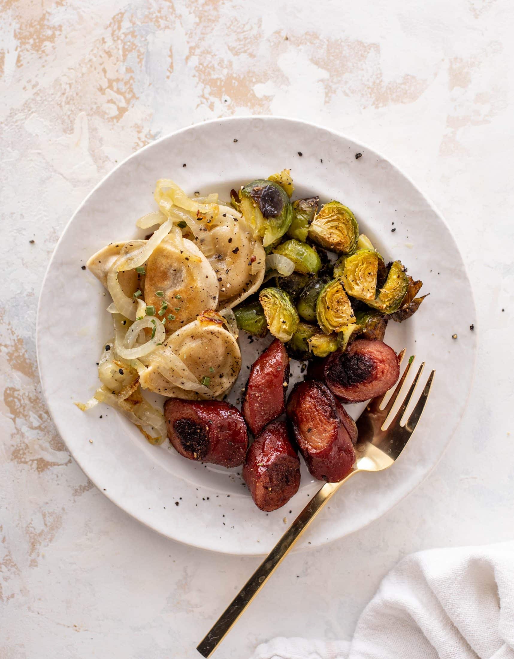 sheet pan pierogi, sausage and brussels sprouts