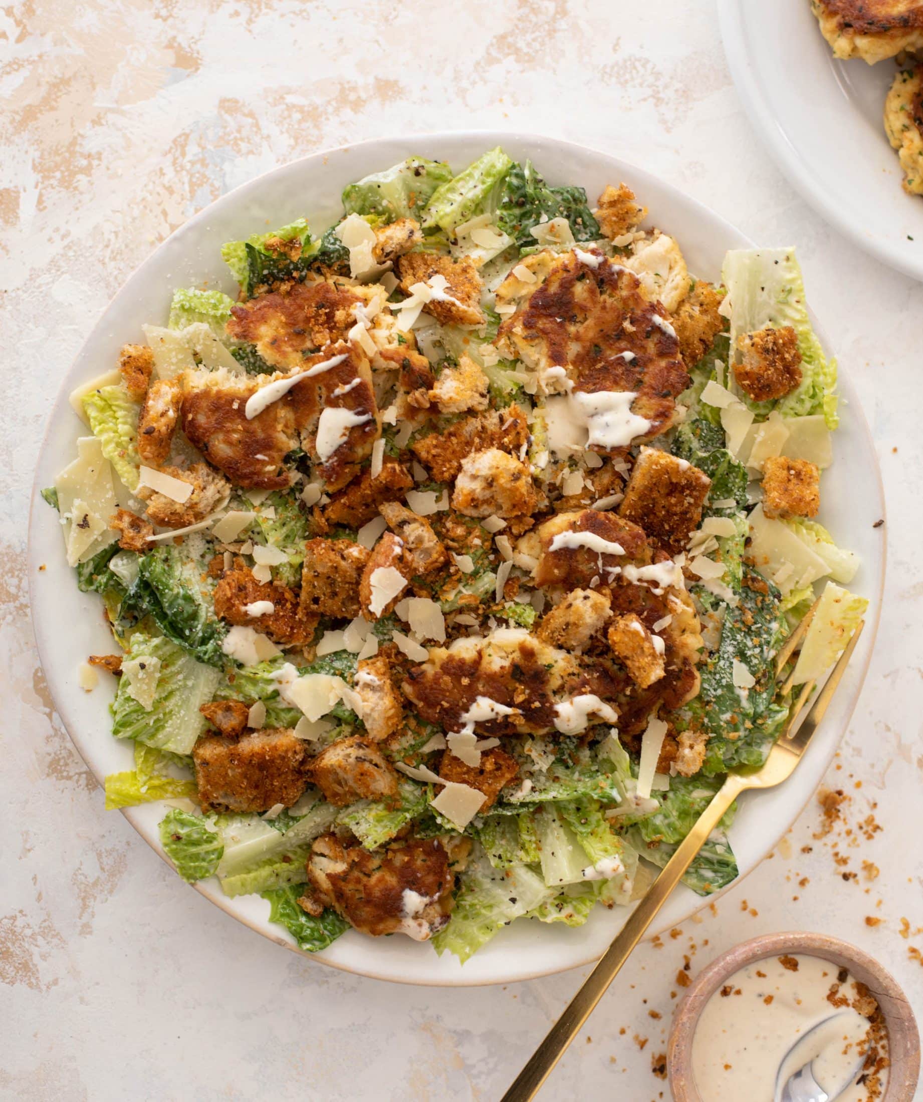 crab cake caesar with old bay croutons