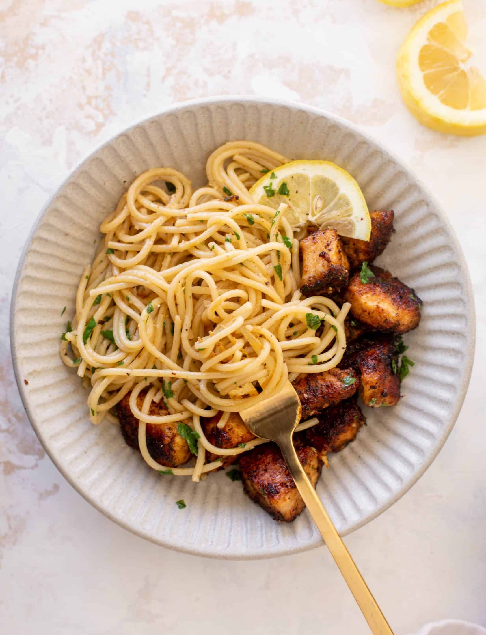 crispy lemon chicken bites and spaghetti
