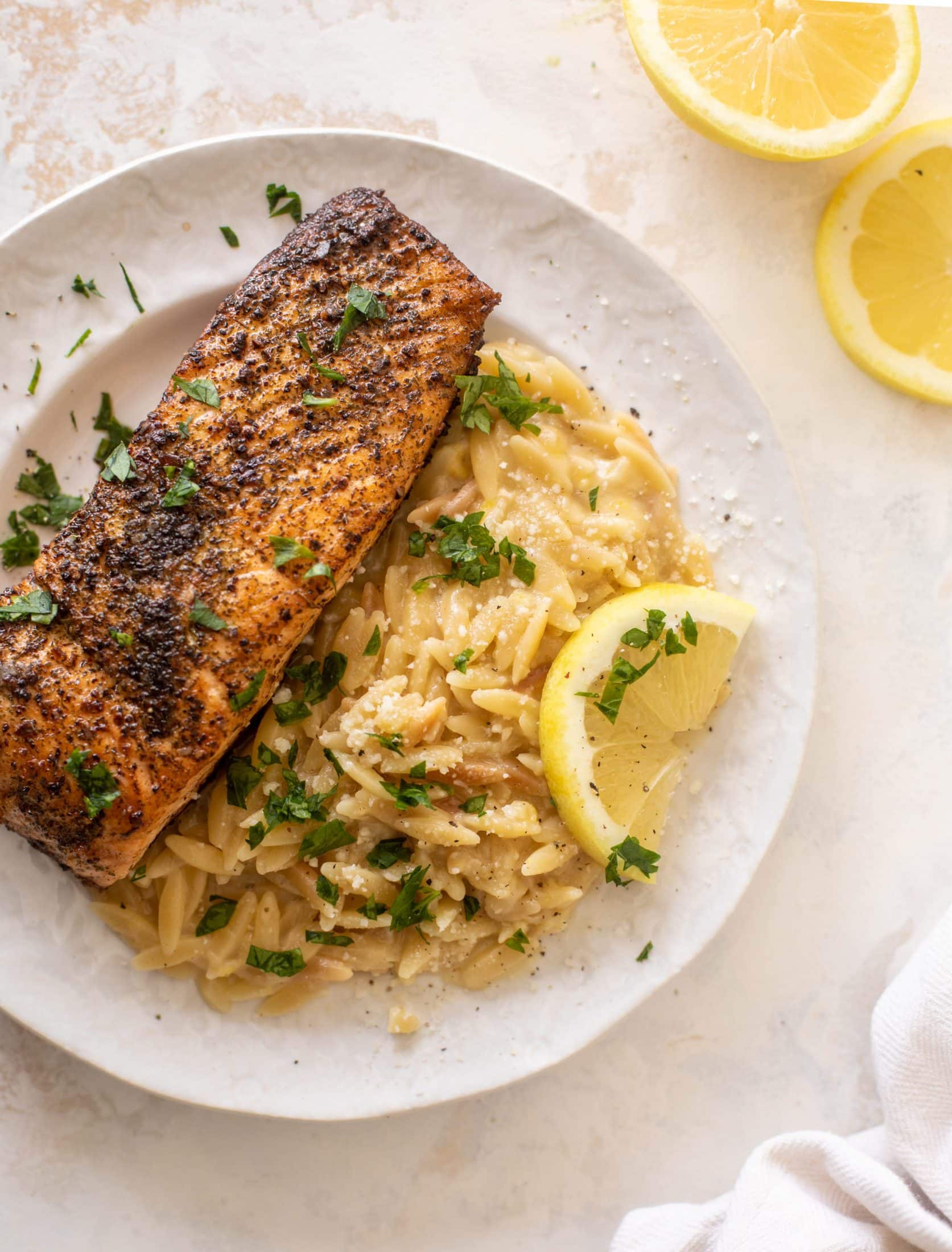 salmon aglio olio with lemon parm orzo