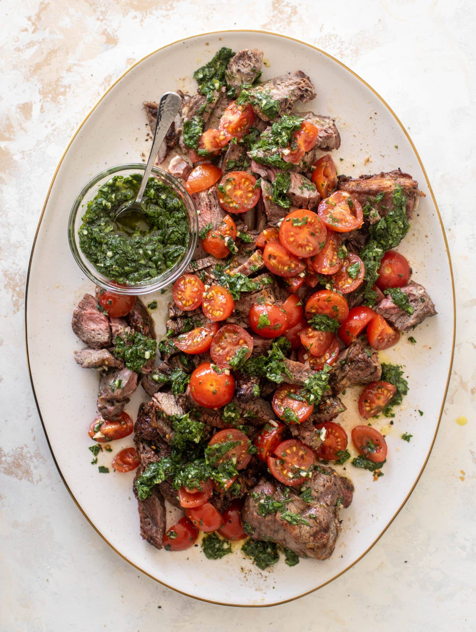 grilled steak with spicy marinated tomatoes