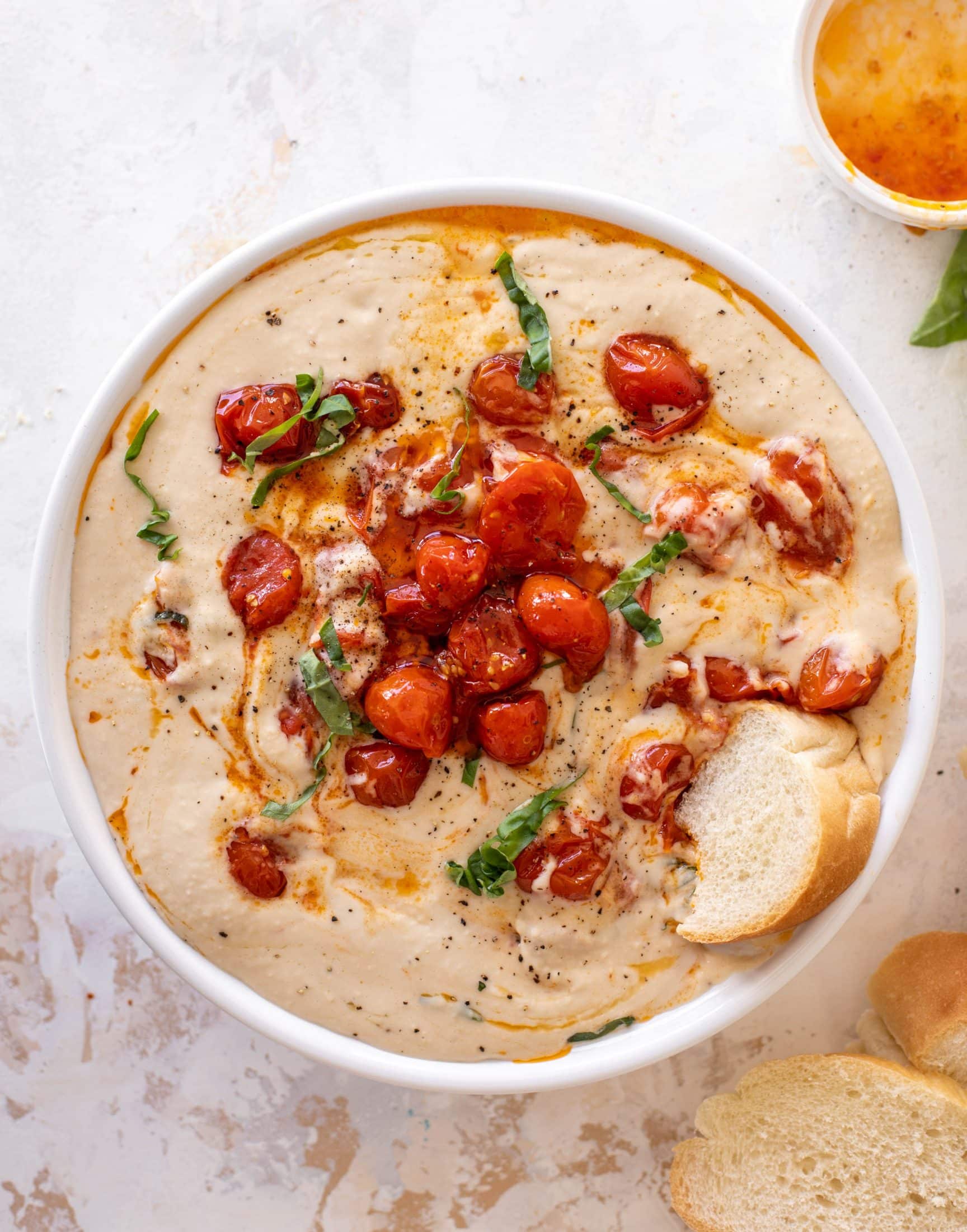 white bean dip with burst tomatoes